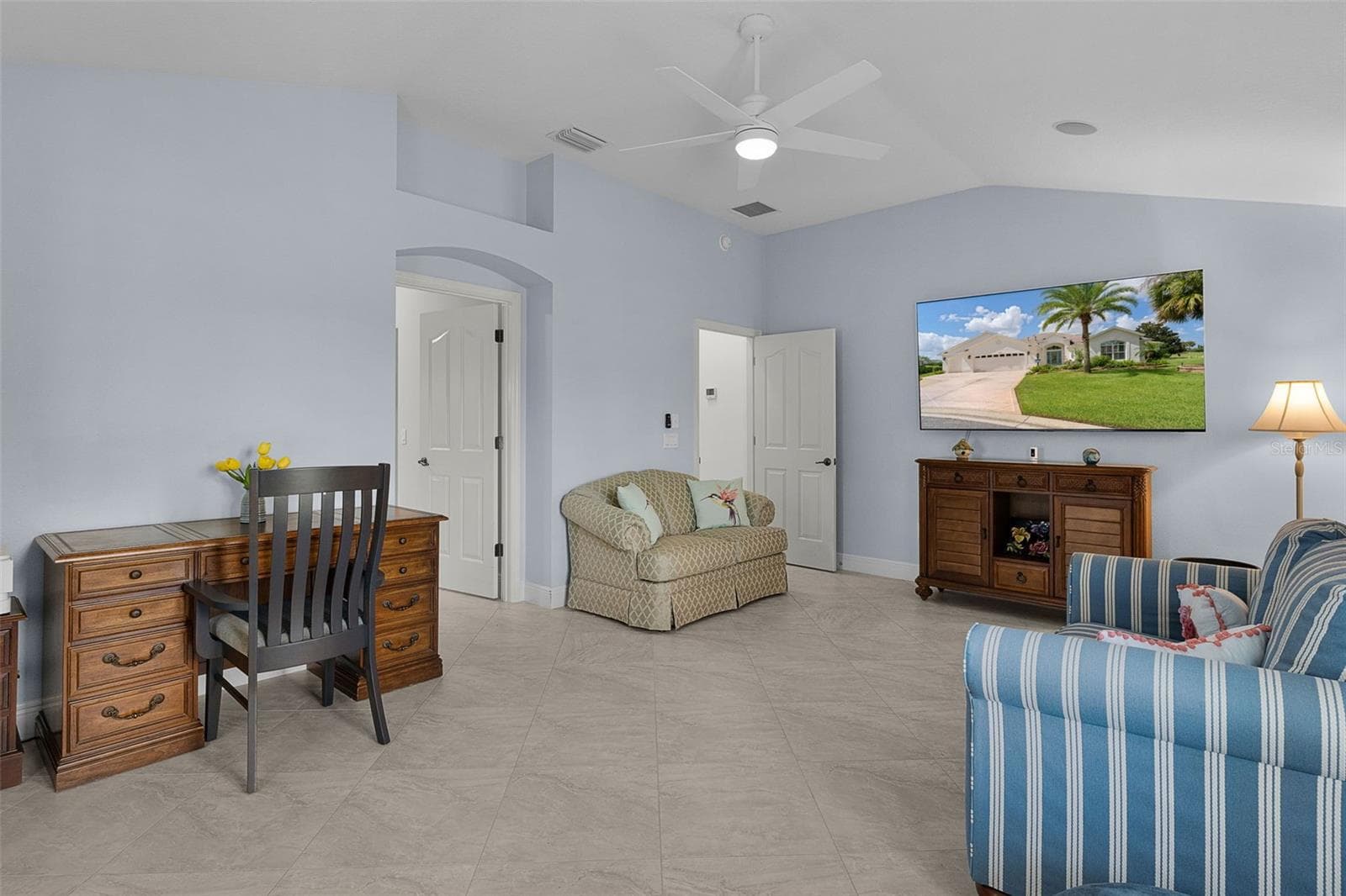 2nd primary bedroom with its own full master bathroom and huge walk-in closetpocket doors open/currently used as an office - 1744 GIST CT, THE VILLAGES