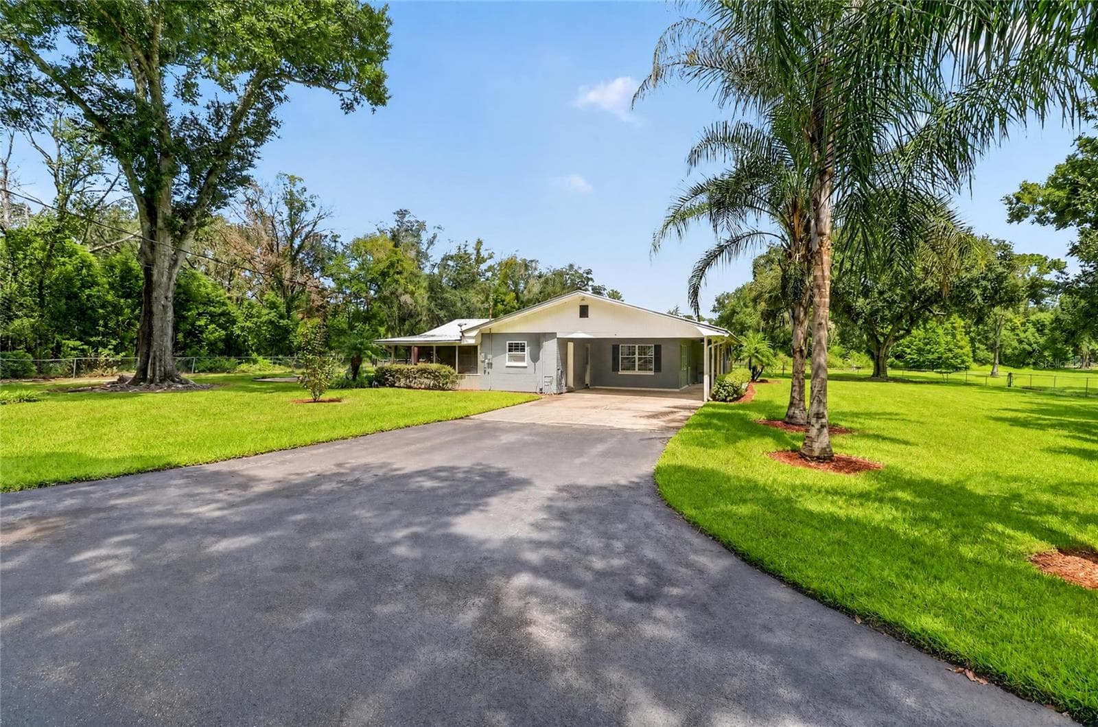 Single Family Residence at 7430 GREEN RD, LAKELAND, photo 2 of 79