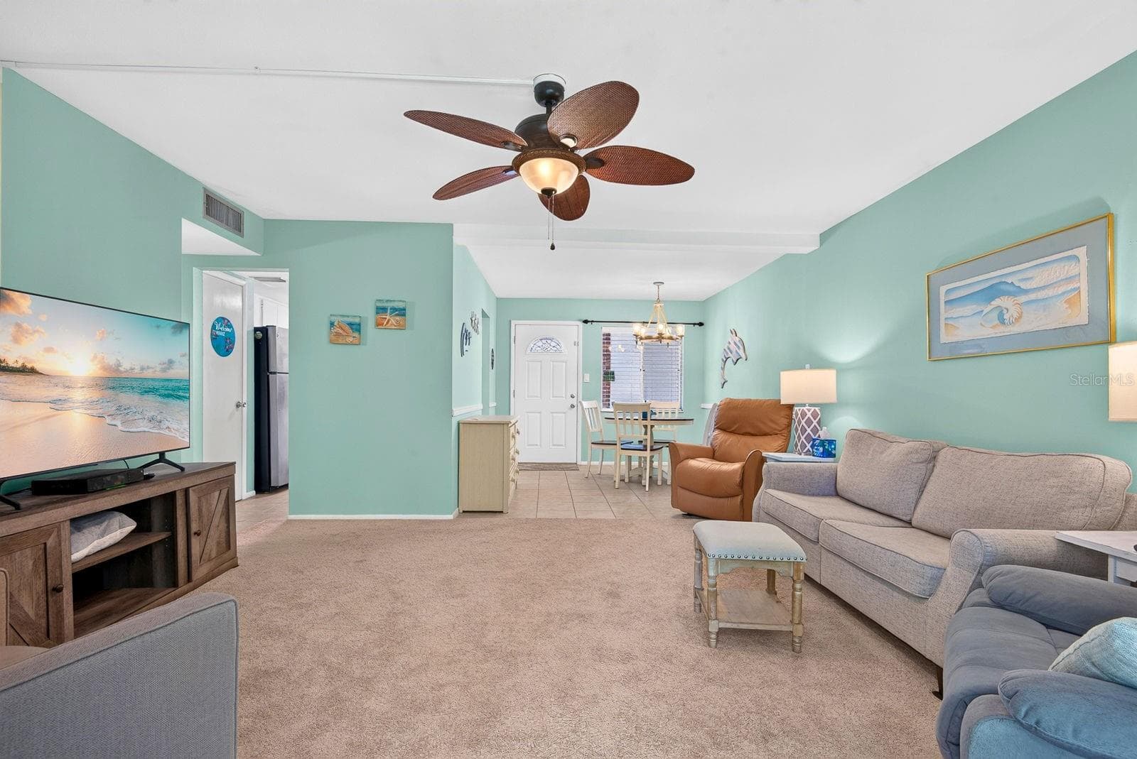 Living room area facing front door - 5853 PALM LN #B7, BRADENTON