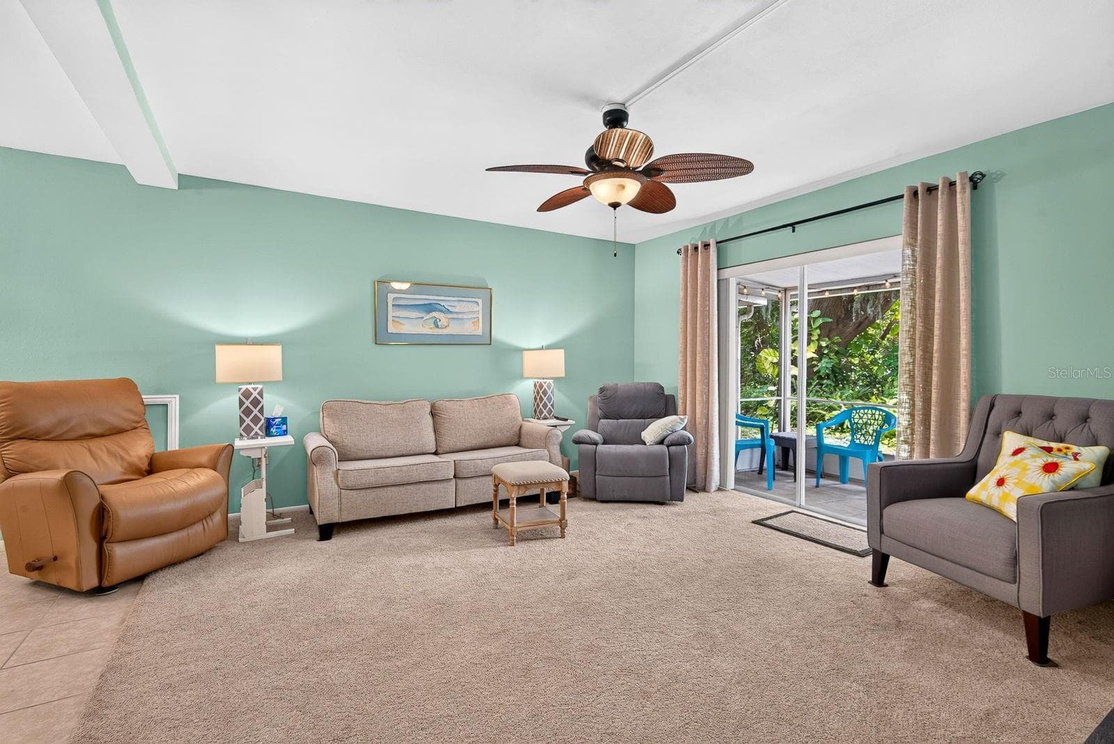 Living area facing lanai - 5853 PALM LN #B7, BRADENTON