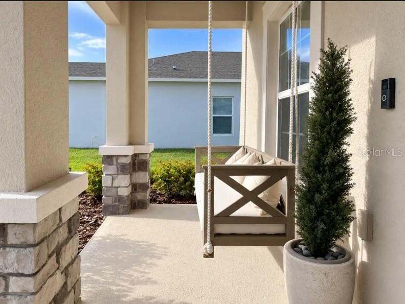 Decorated Front Porch - 5357 TUSCANY LN, DAVENPORT