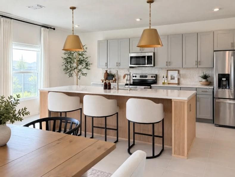 Kitchen Island-modern finishes - 5357 TUSCANY LN, DAVENPORT