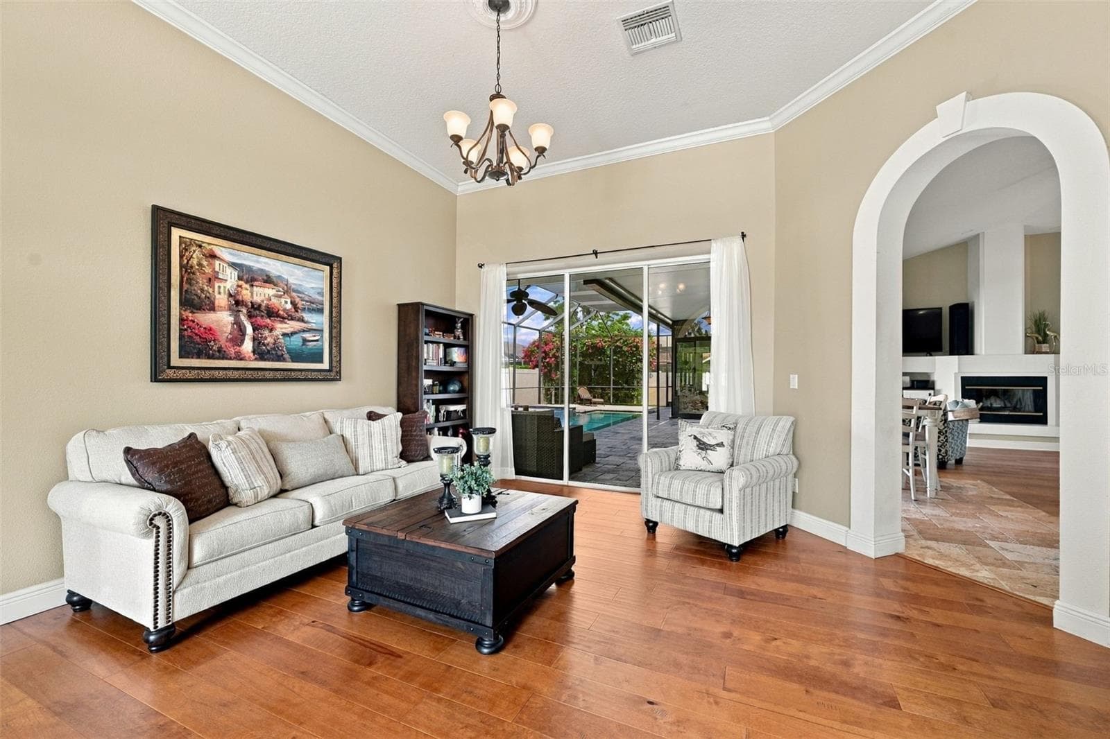 Living room overlooking pool - 2966 HILLCREEK CIR S, CLEARWATER