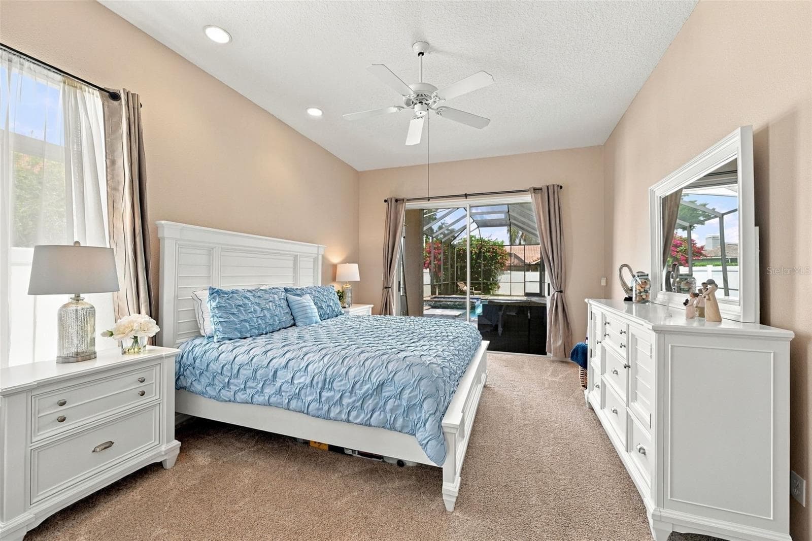 Primary bedroom with access to pool - 2966 HILLCREEK CIR S, CLEARWATER