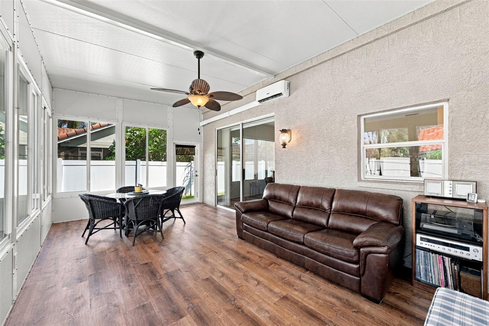 Sunroom with hurricane rated doors and sliding windows - 2966 HILLCREEK CIR S, CLEARWATER