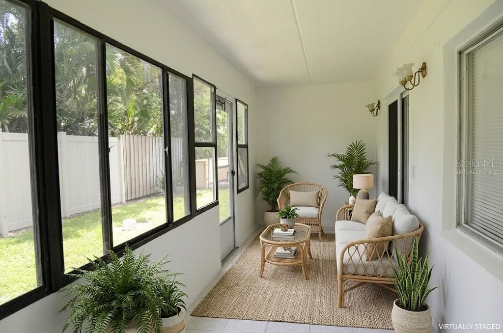 virtually staged porch - 4435 1ST ST NE #111, ST PETERSBURG