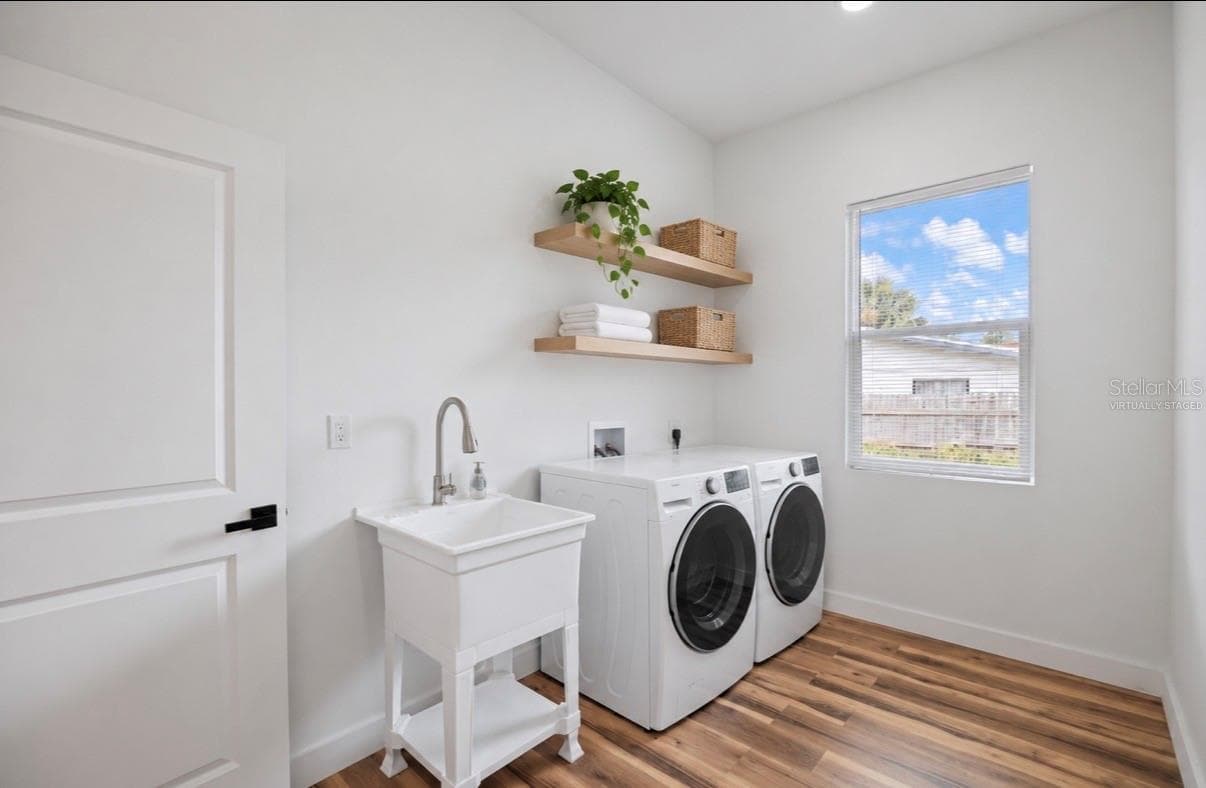 Virtually staged inside laundry room - 611 ELM ST, SAFETY HARBOR