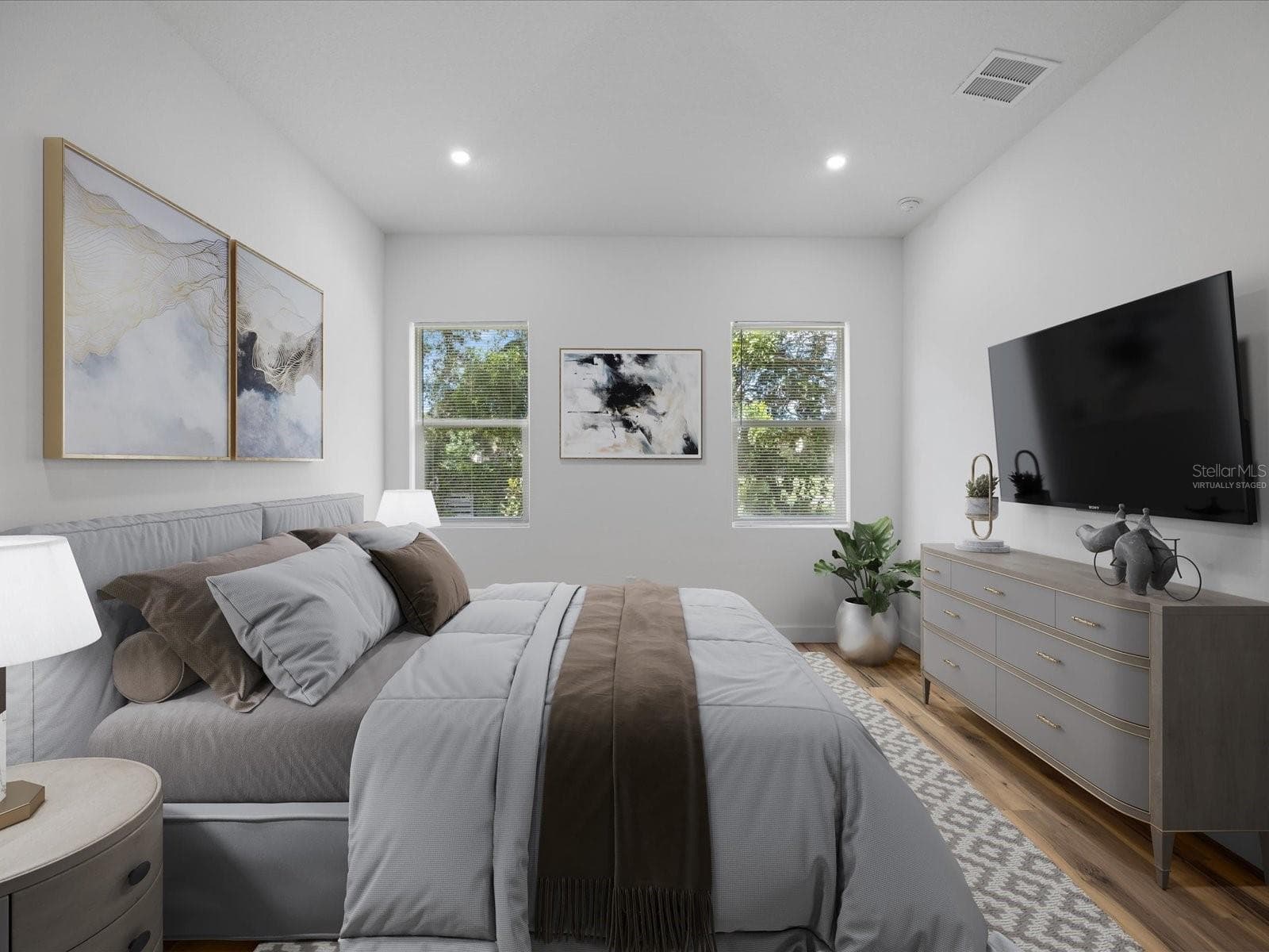 Virtually staged primary bedroom - 611 ELM ST, SAFETY HARBOR