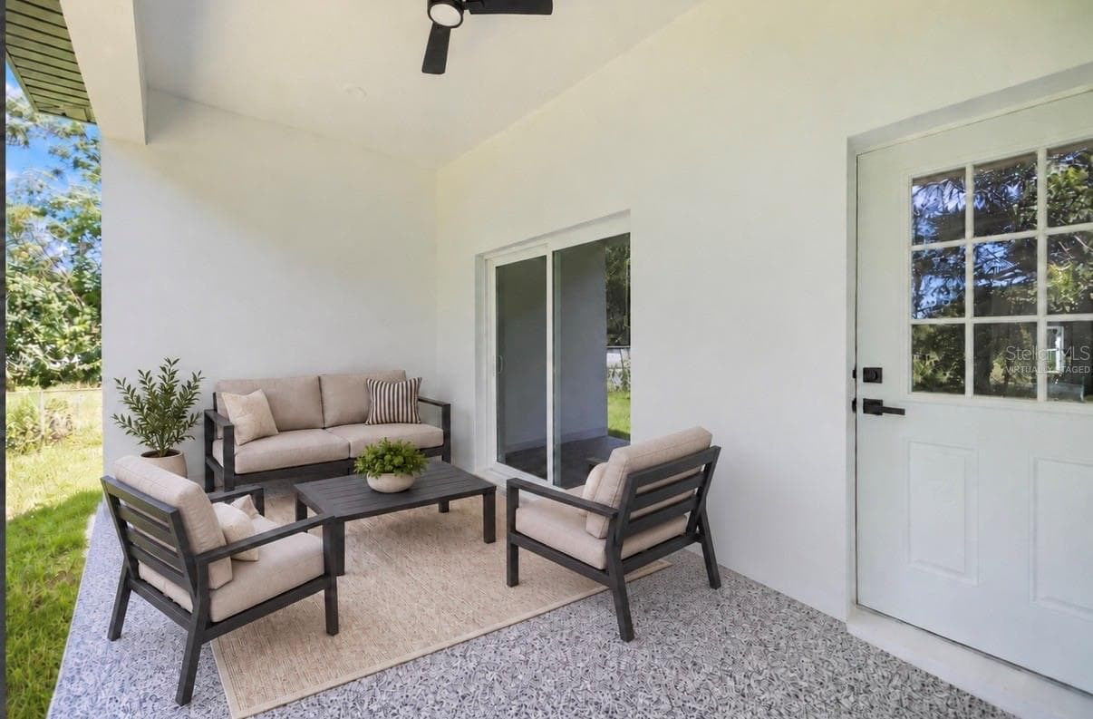 Virtually staged patio - 611 ELM ST, SAFETY HARBOR