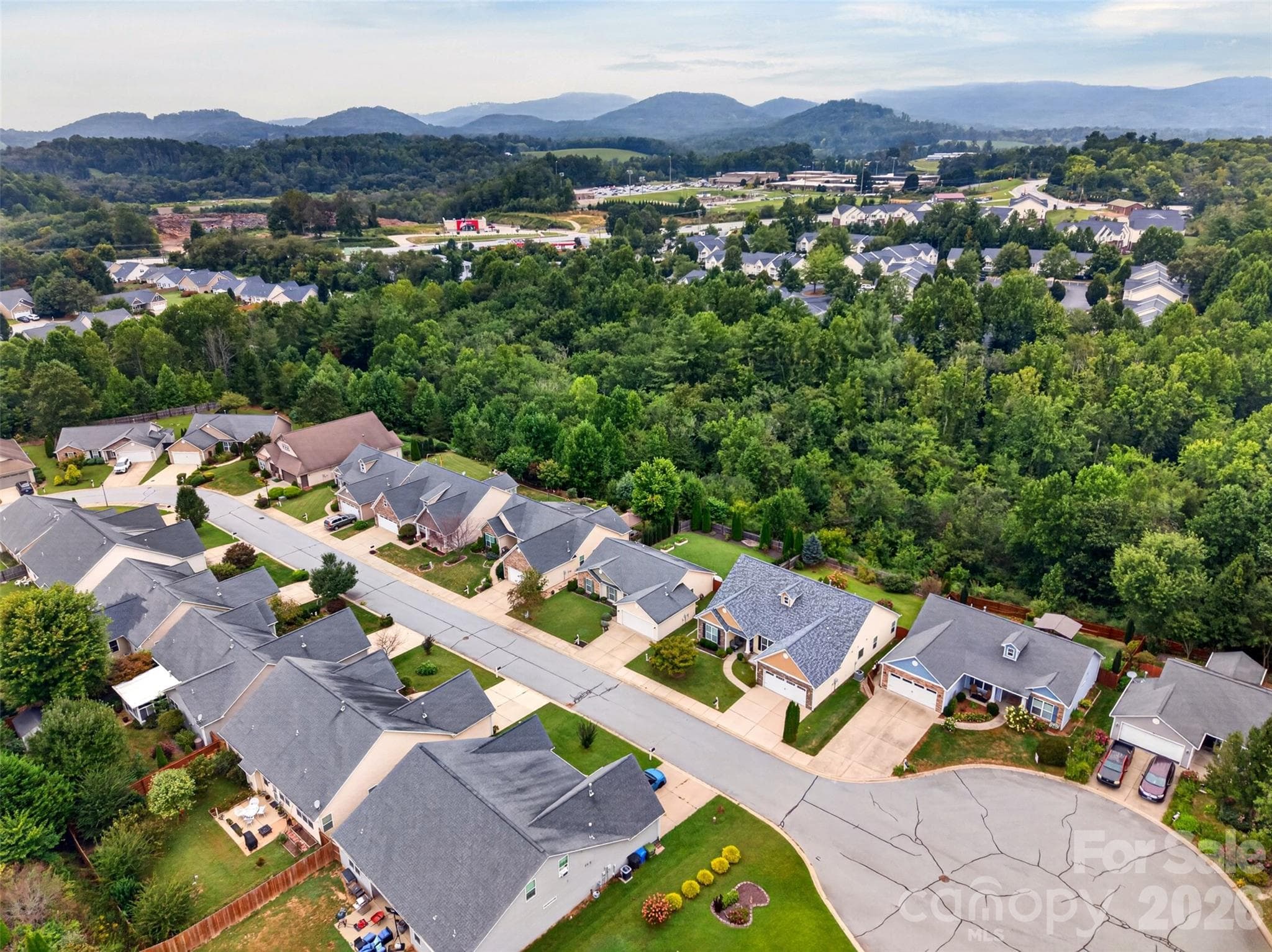 Just a minute or so from those Friday night football games you might enjoy! :) - 105 Creekwalk Lane, Hendersonville