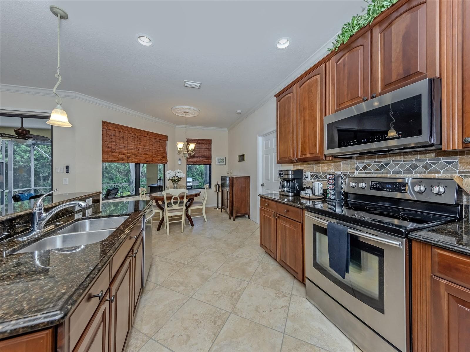 Kitchen with stainless steel appliances - 20702 CAPELLO DR, VENICE