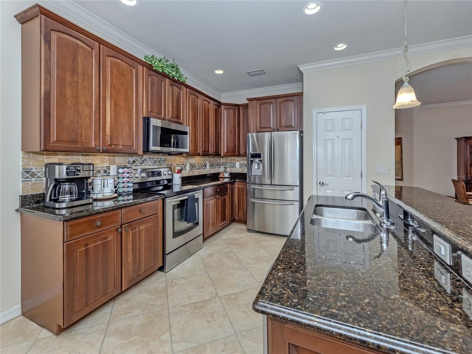 Kitchen with pantry - 20702 CAPELLO DR, VENICE