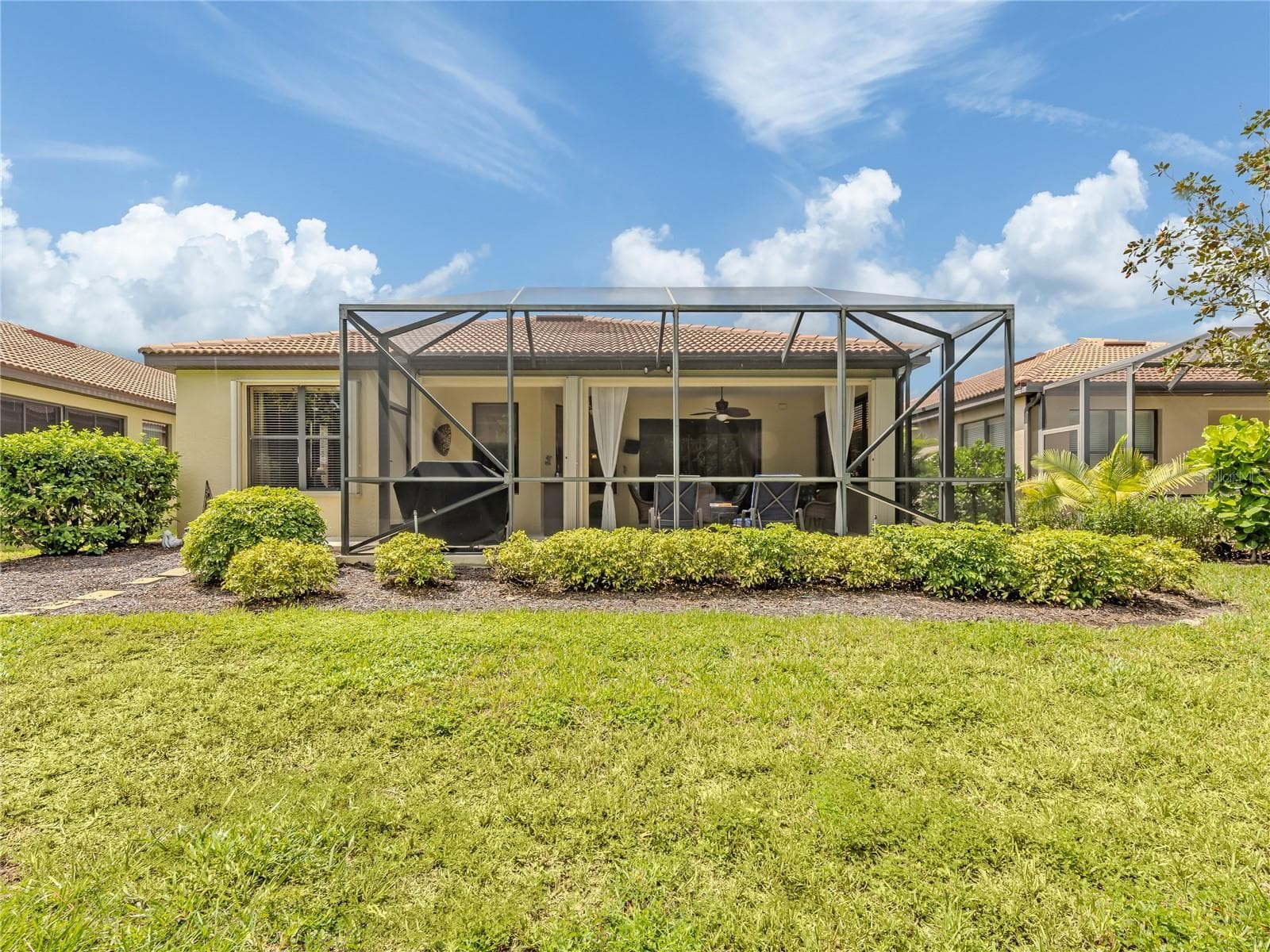 Back view of the home - 20702 CAPELLO DR, VENICE