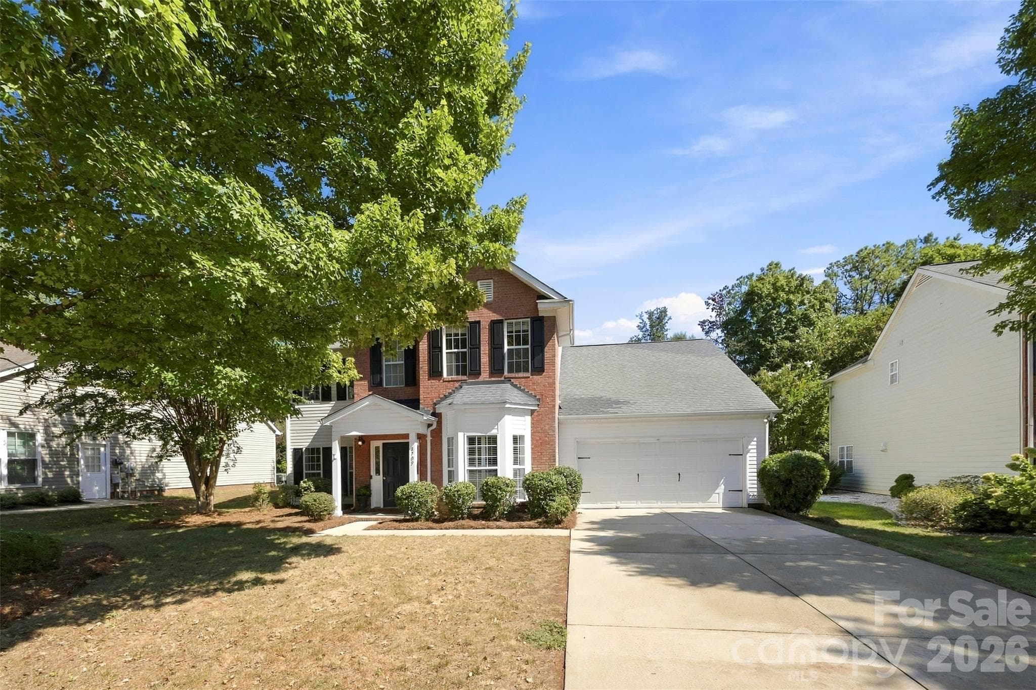 Front view with mature tree - 8709 Ellington Park Drive, Charlotte