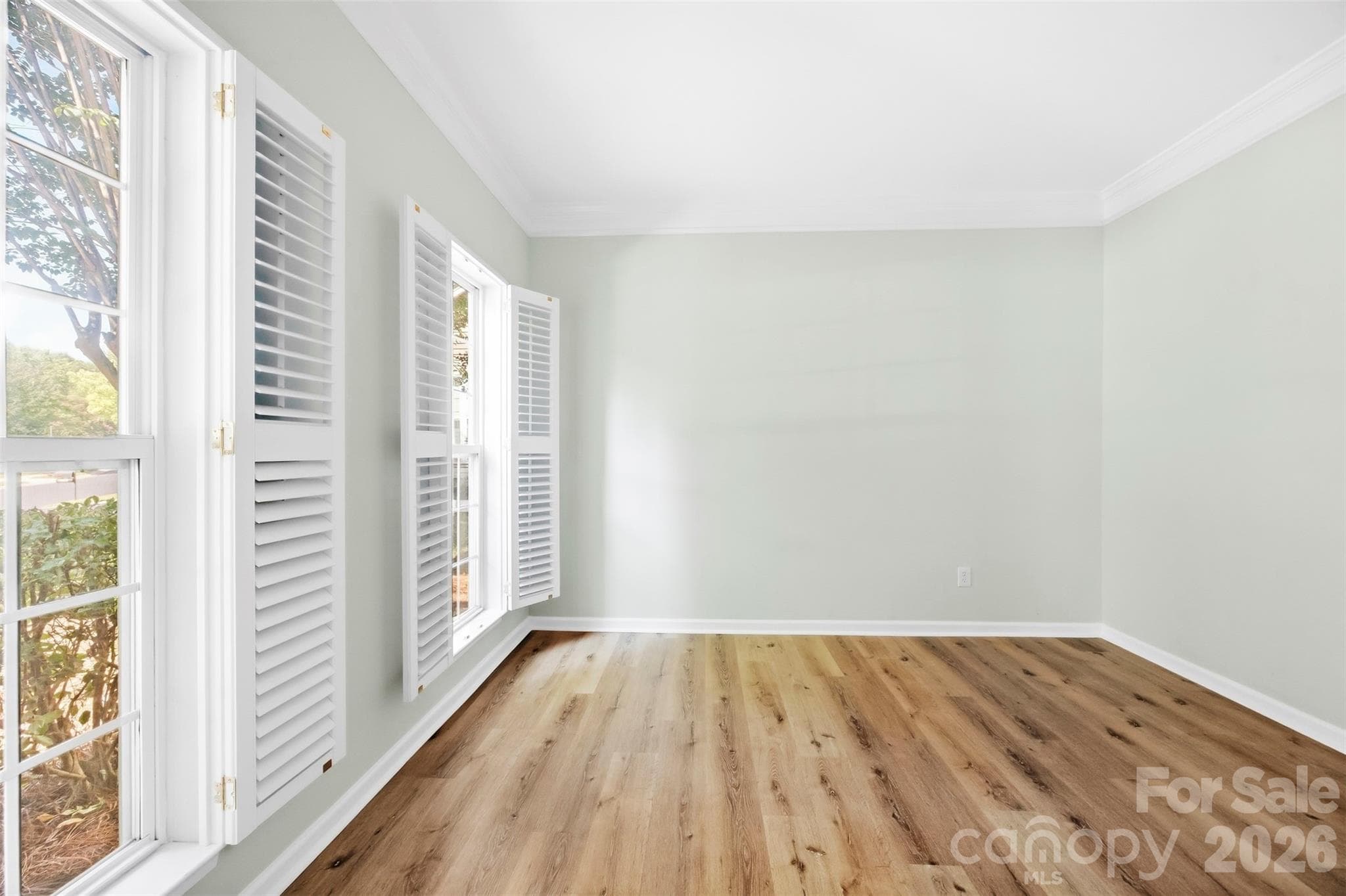 Study with plantation shutters - 8709 Ellington Park Drive, Charlotte