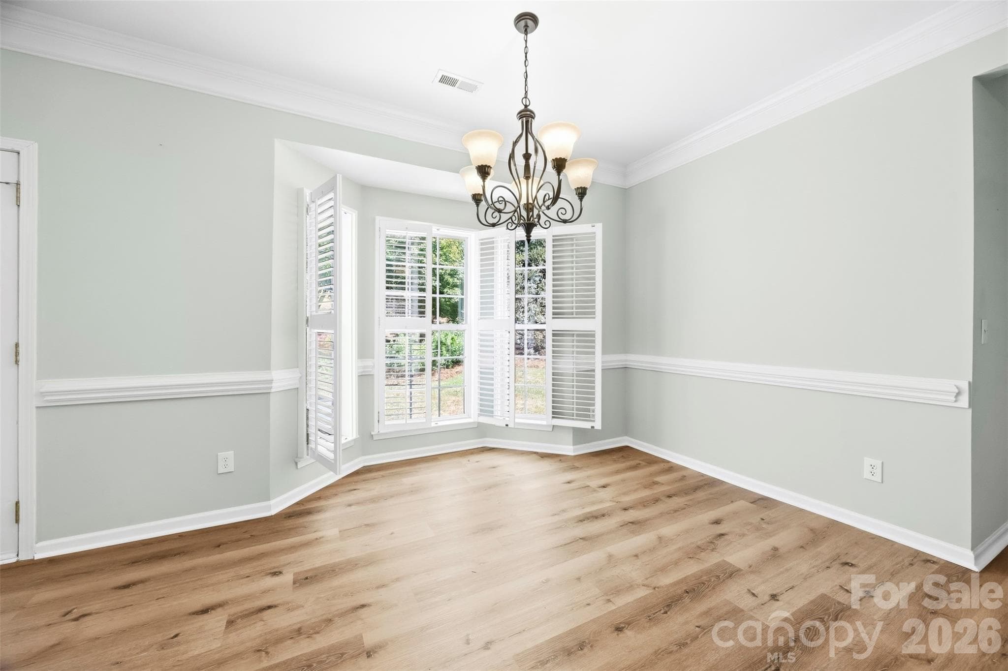 Breakfast room with planation shutters - 8709 Ellington Park Drive, Charlotte