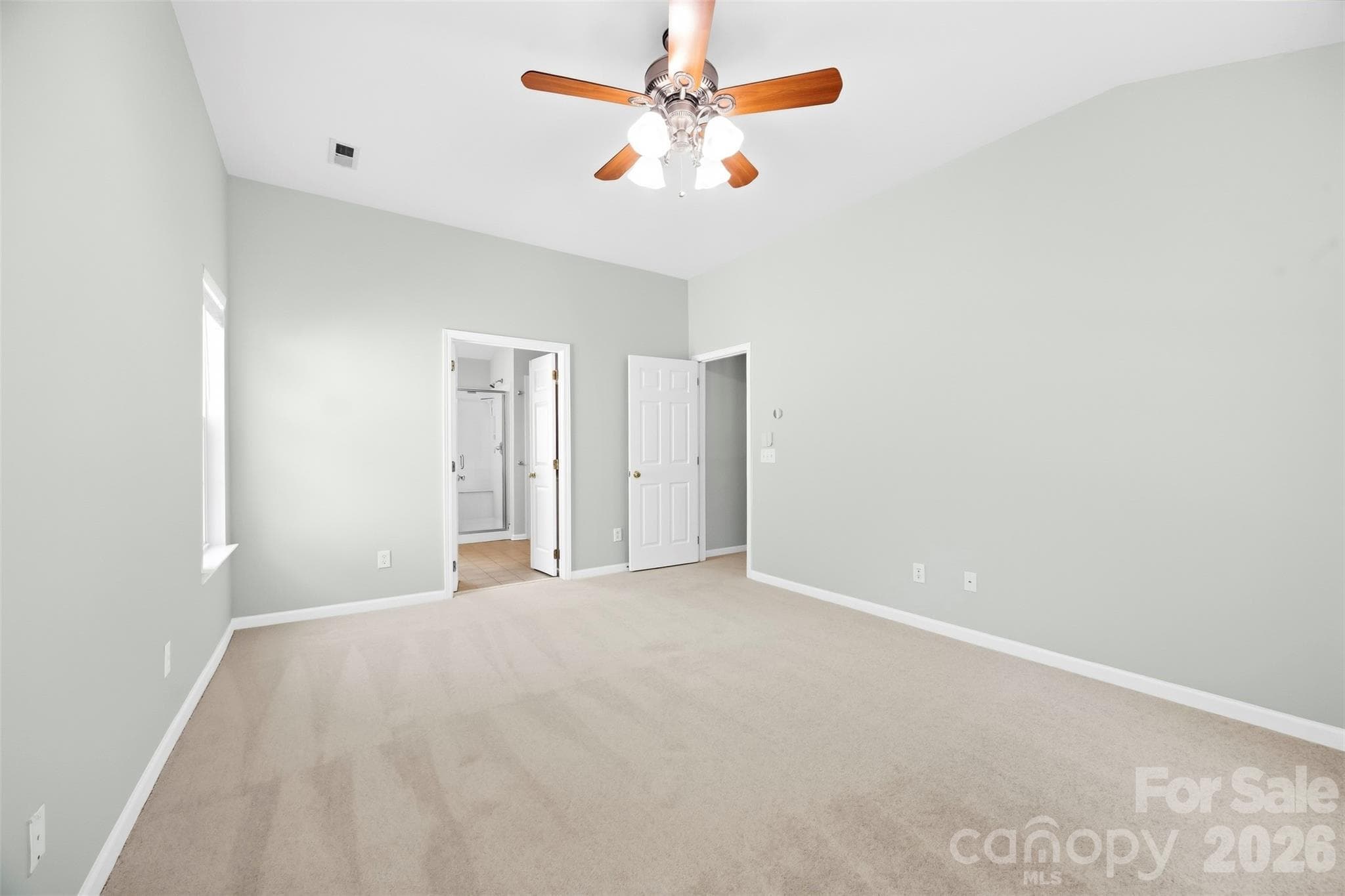 Primary Bedroom view to en-suite bathroom - 8709 Ellington Park Drive, Charlotte