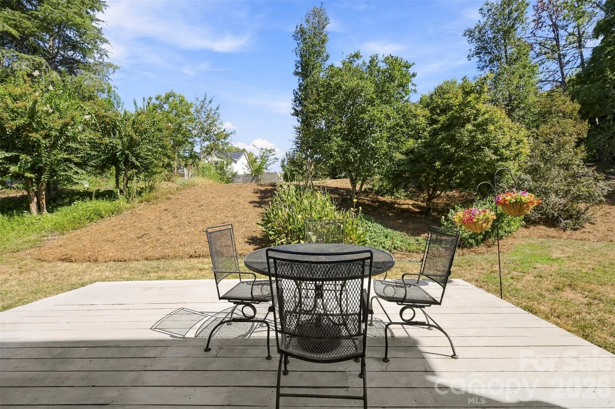 View from deck to landscaped backyard - 8709 Ellington Park Drive, Charlotte