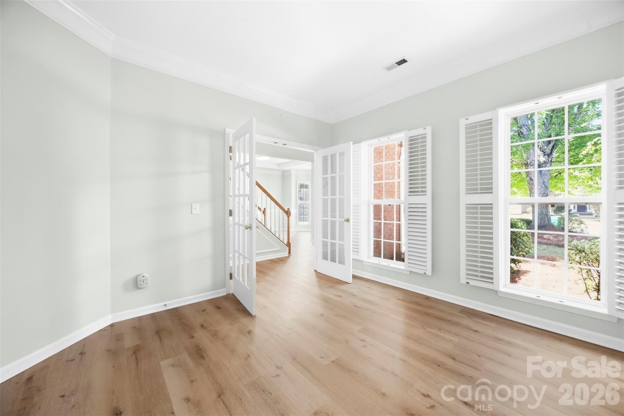 Study view to french doord to Foyer - 8709 Ellington Park Drive, Charlotte