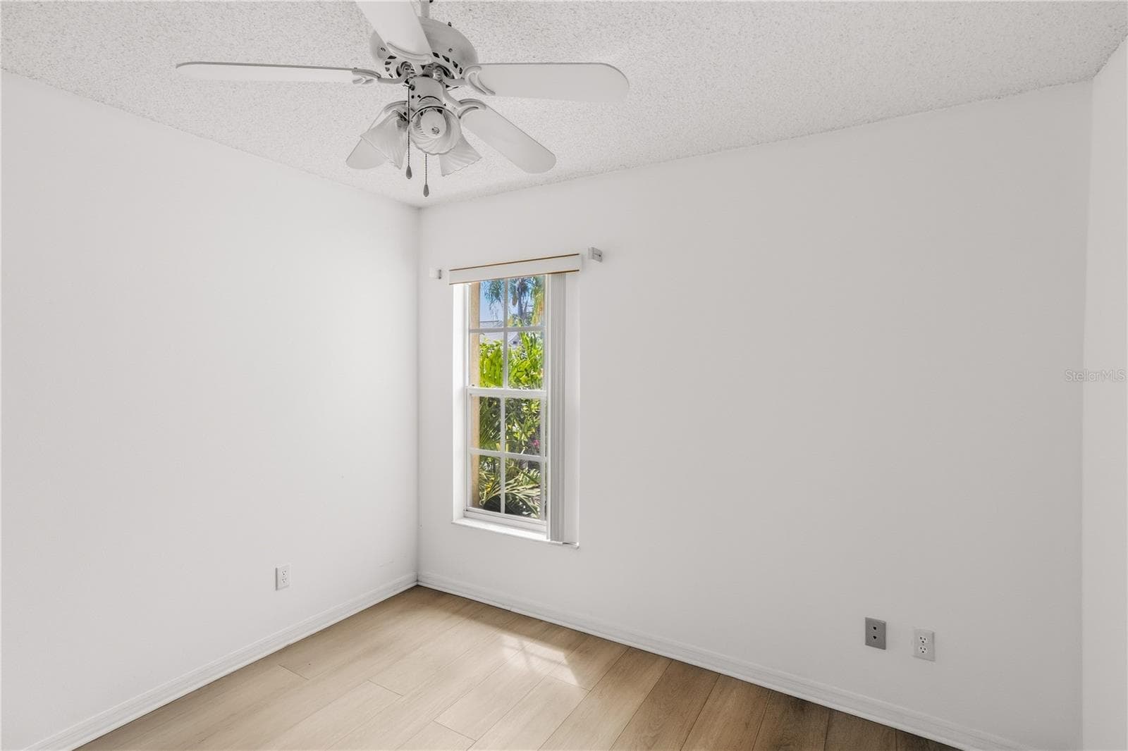 Front Bedroom with view out front - 1002 NICENE CT #47, SUN CITY CENTER