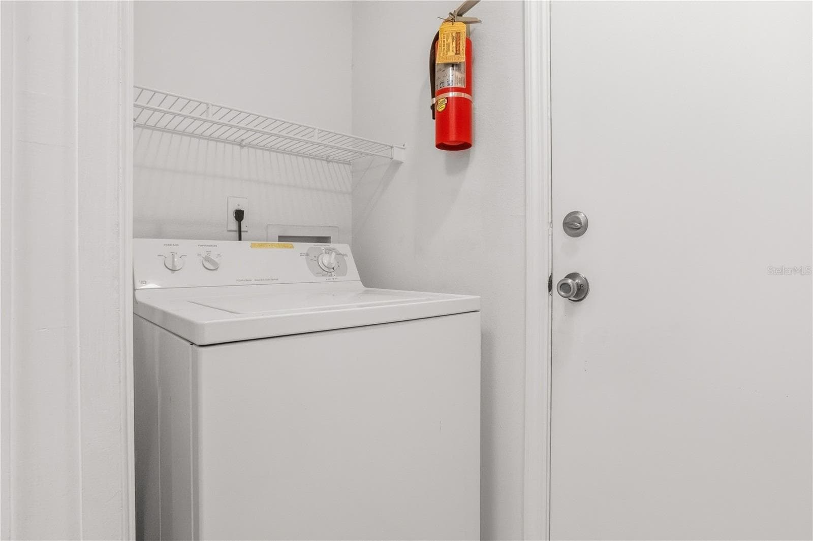 Convenient private laundry area with dedicated space for everyday laundry needs. - 1002 NICENE CT #47, SUN CITY CENTER