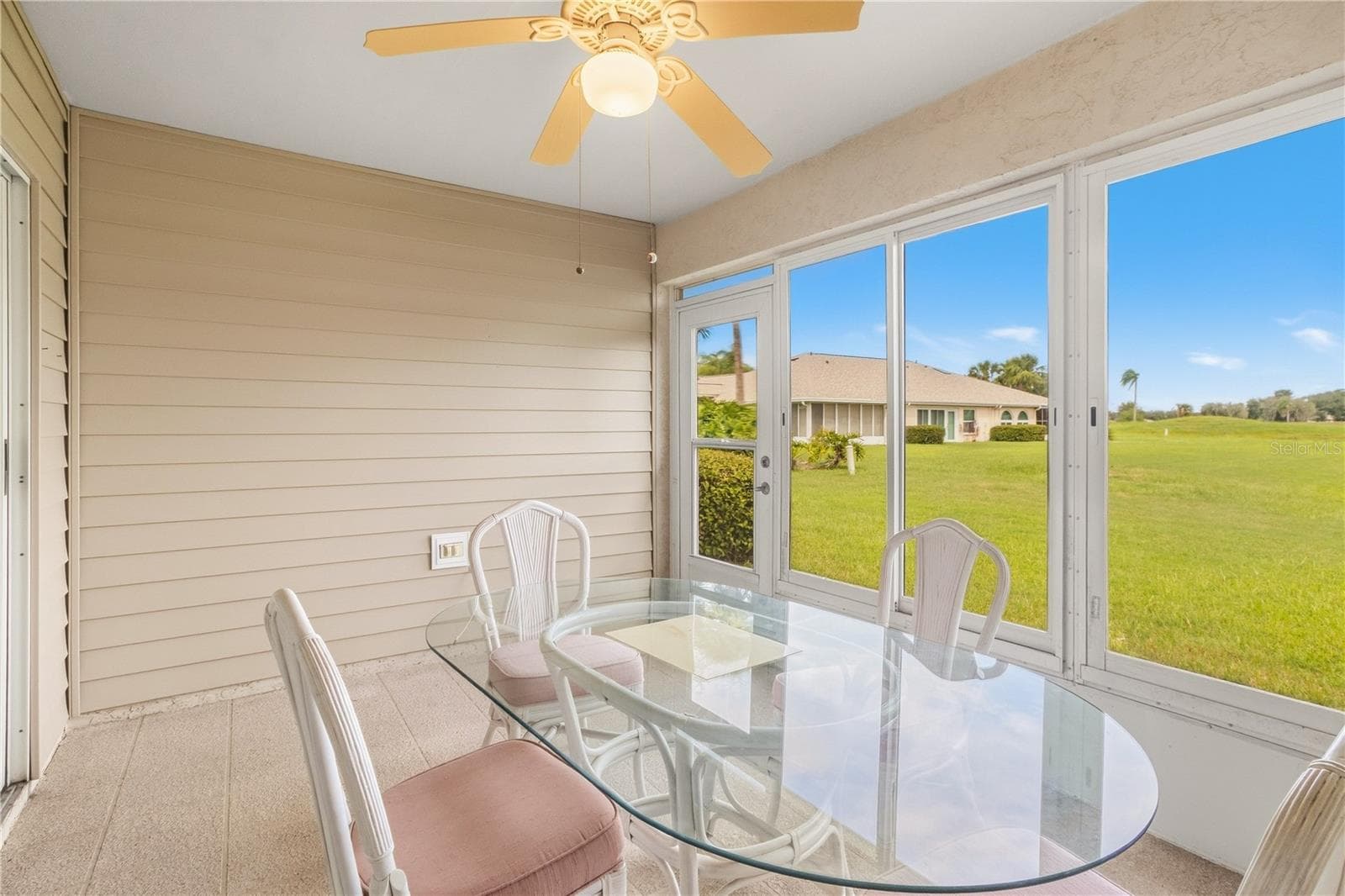 Enclosed back lanai offering additional living space - 1002 NICENE CT #47, SUN CITY CENTER