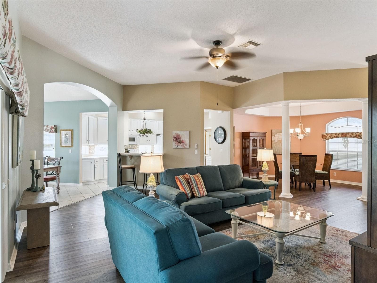 Living & Dining areas are open ~ Breakfast Nook & Bar left, Living Room center and Dining Area right of photo. - 5401 ESSEX CT, LEESBURG
