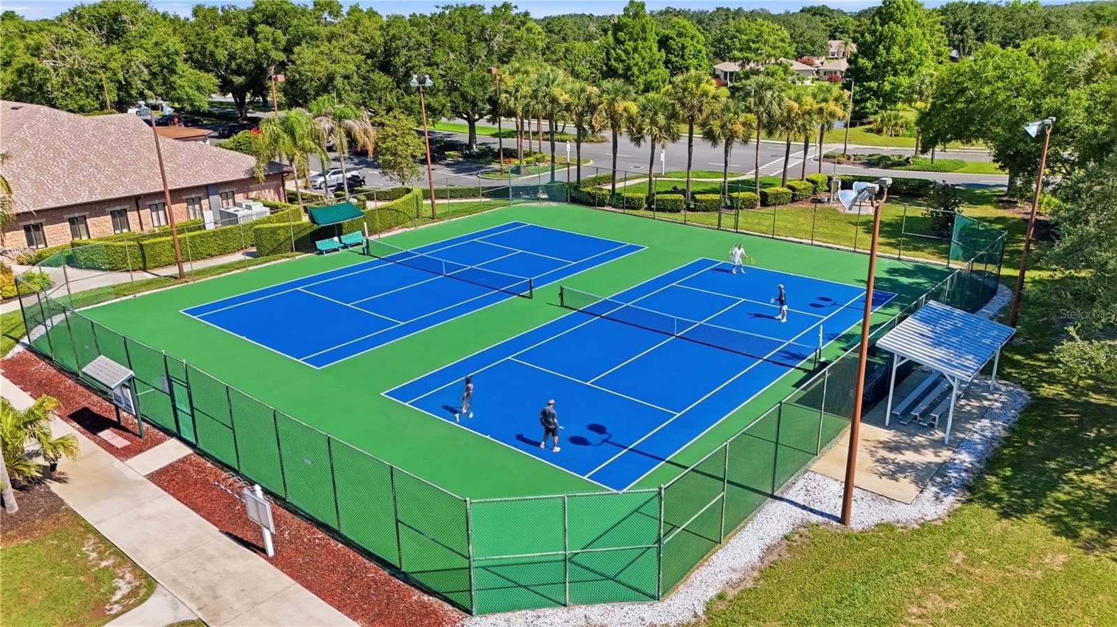 There are four (4) TENNIS COURTS. - 5401 ESSEX CT, LEESBURG