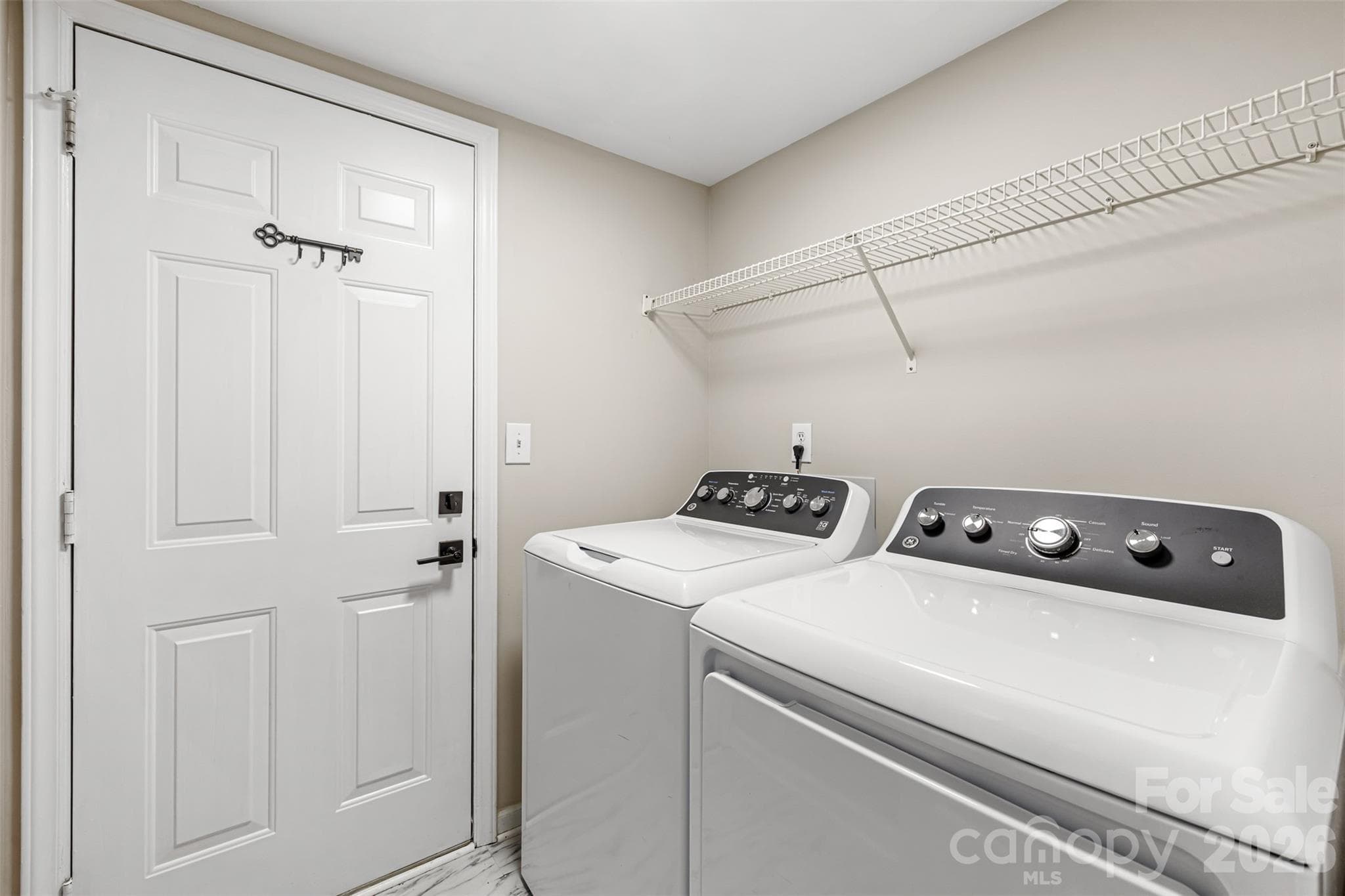 Laundry leading to garage - 6818 Millingden Court, Charlotte