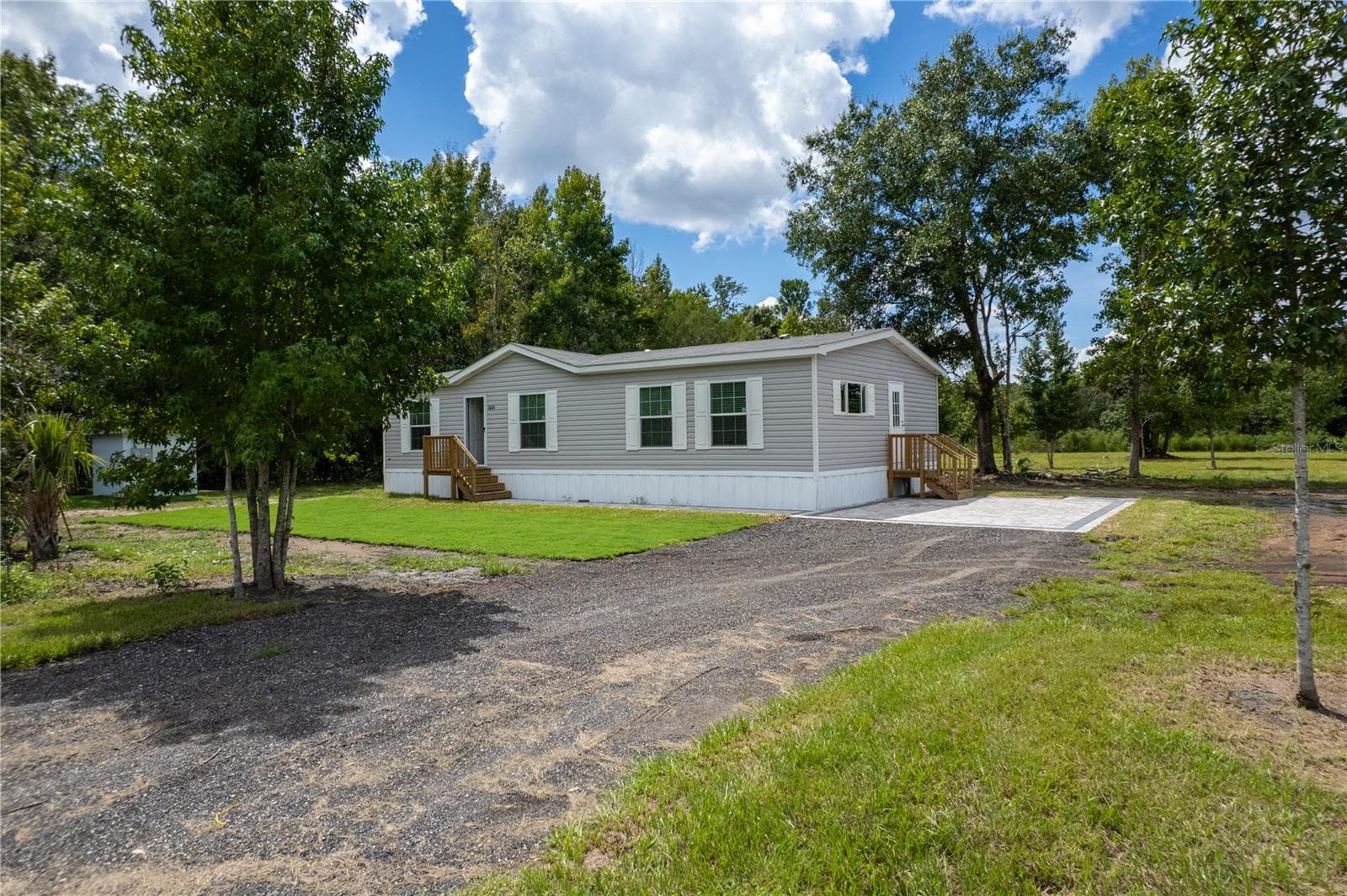 Modular Home at 1666 MISTLETOE ST, BUNNELL, photo 2 of 26