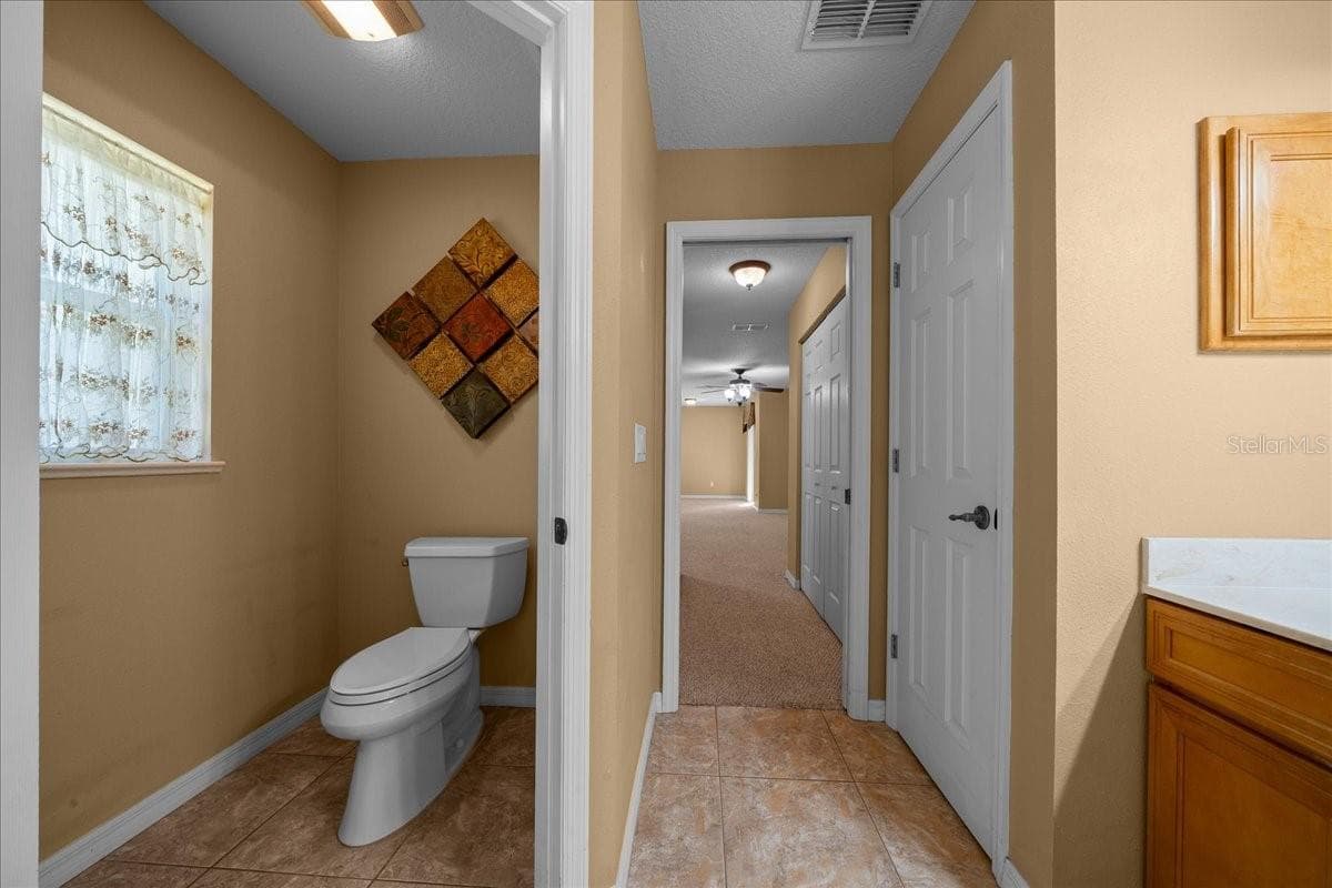 Primary Bathroom private toilet - 8479 SW 134TH AVE, DUNNELLON