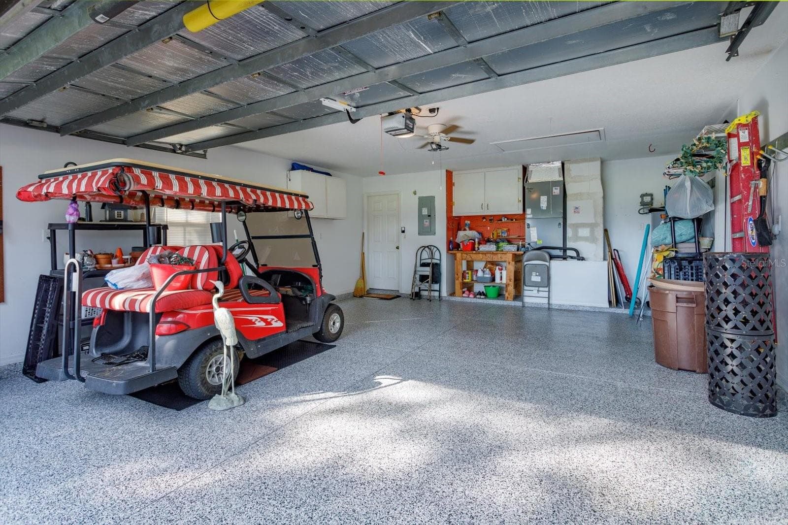 New floor treatment in the garage is gorgeous - 25845 GLEN EAGLE DR, LEESBURG