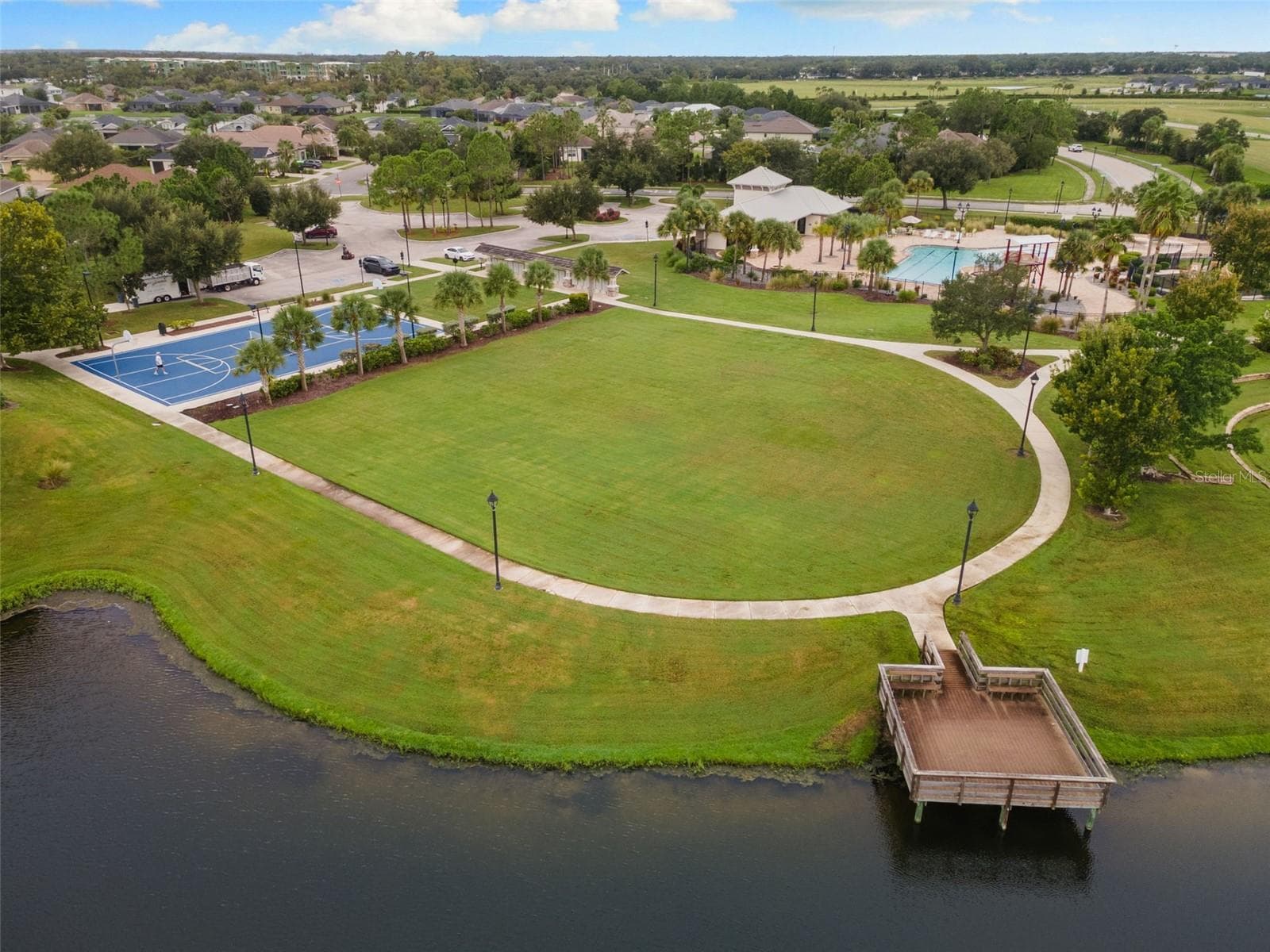 WALKING TRAIL ON LAKE WITH DOCK - 12743 RAINWASHED LOOP, PARRISH