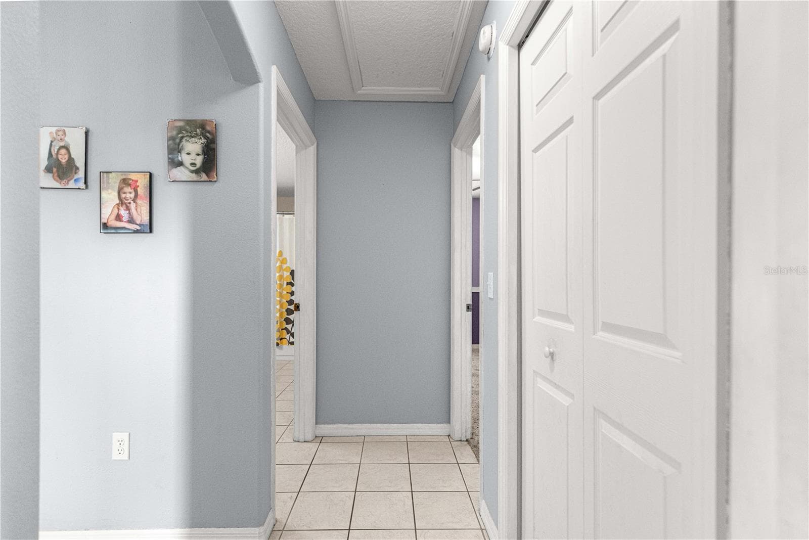 Hallway to other Bedrooms - 10100 SE 69TH TER, BELLEVIEW