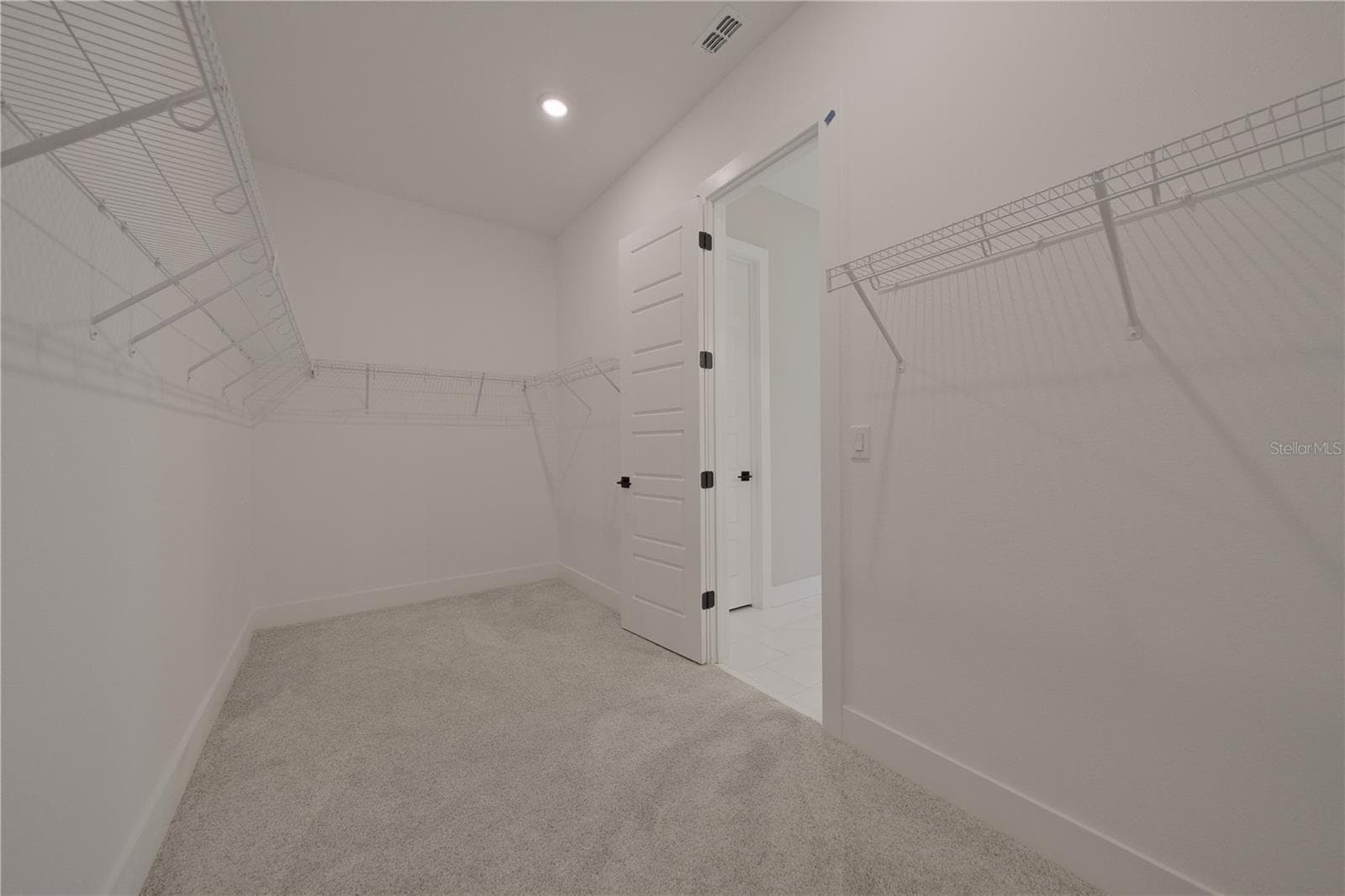 PRIMARY WALK-IN CLOSET - 7328 GREAT EGRET BLVD, SARASOTA
