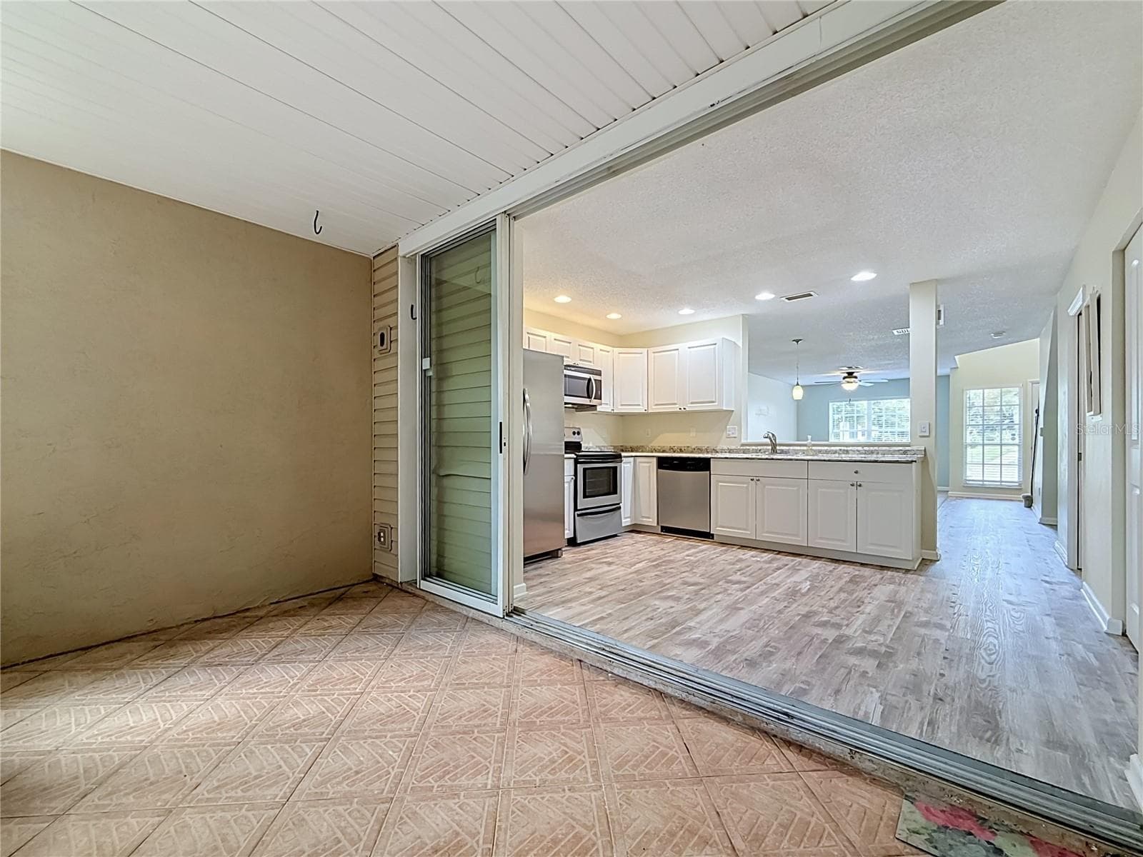 Patio off Kitchen - 2106 CLOVER HILL RD, PALM HARBOR