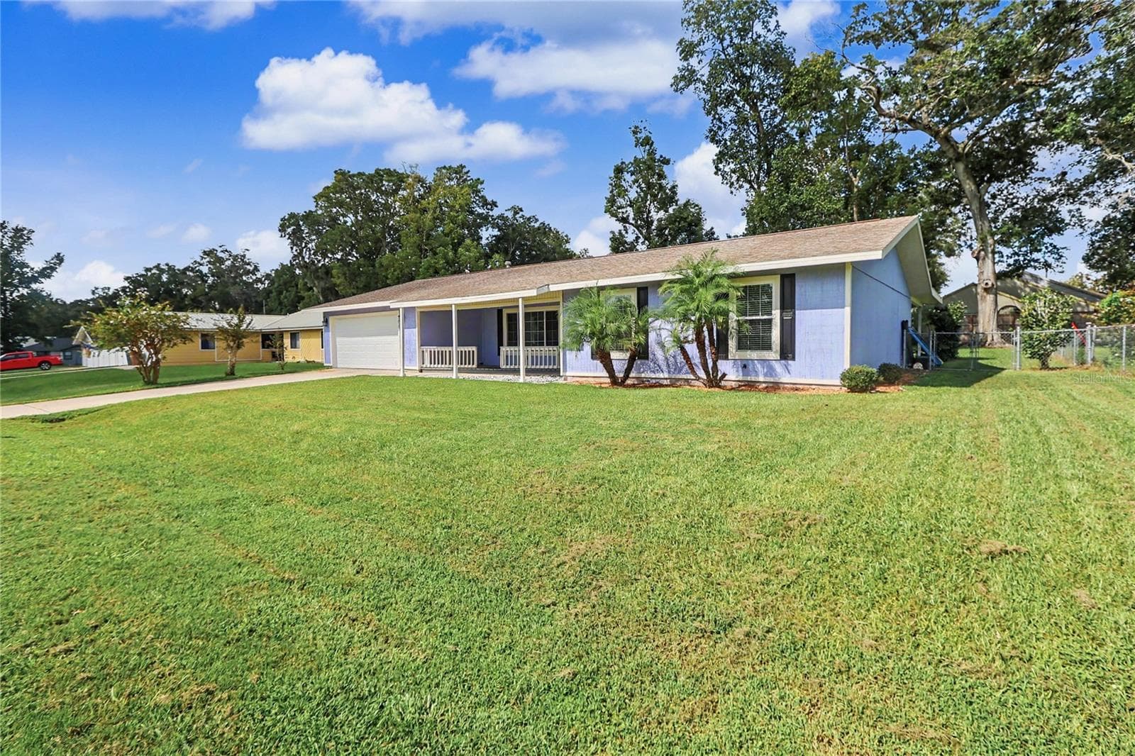 Side front view - 436 NE 47TH CT, OCALA