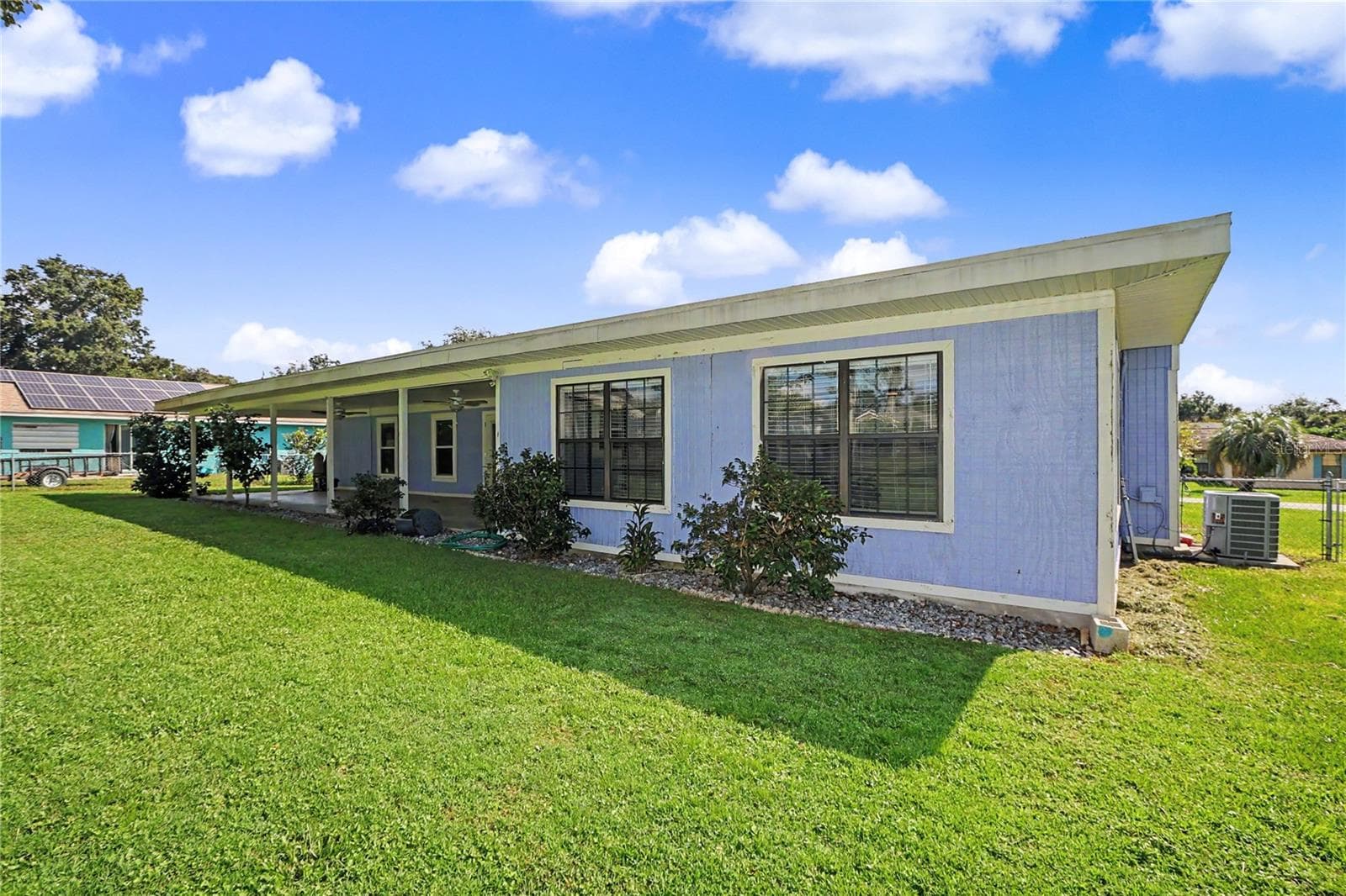 Rear view of home - 436 NE 47TH CT, OCALA