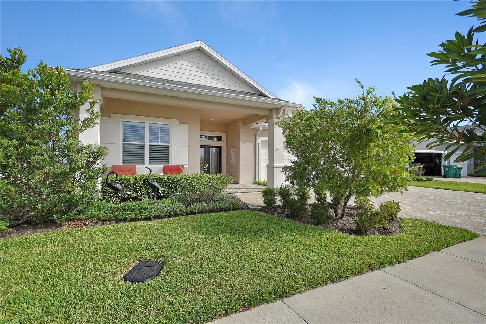Front porch and bottle brush tree - 1011 MEGANO BLVD, DELAND