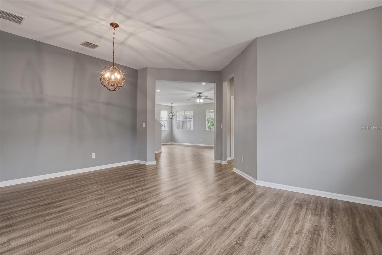Foyer and Dining Room Empty - 16742 ABBEY HILL CT, CLERMONT