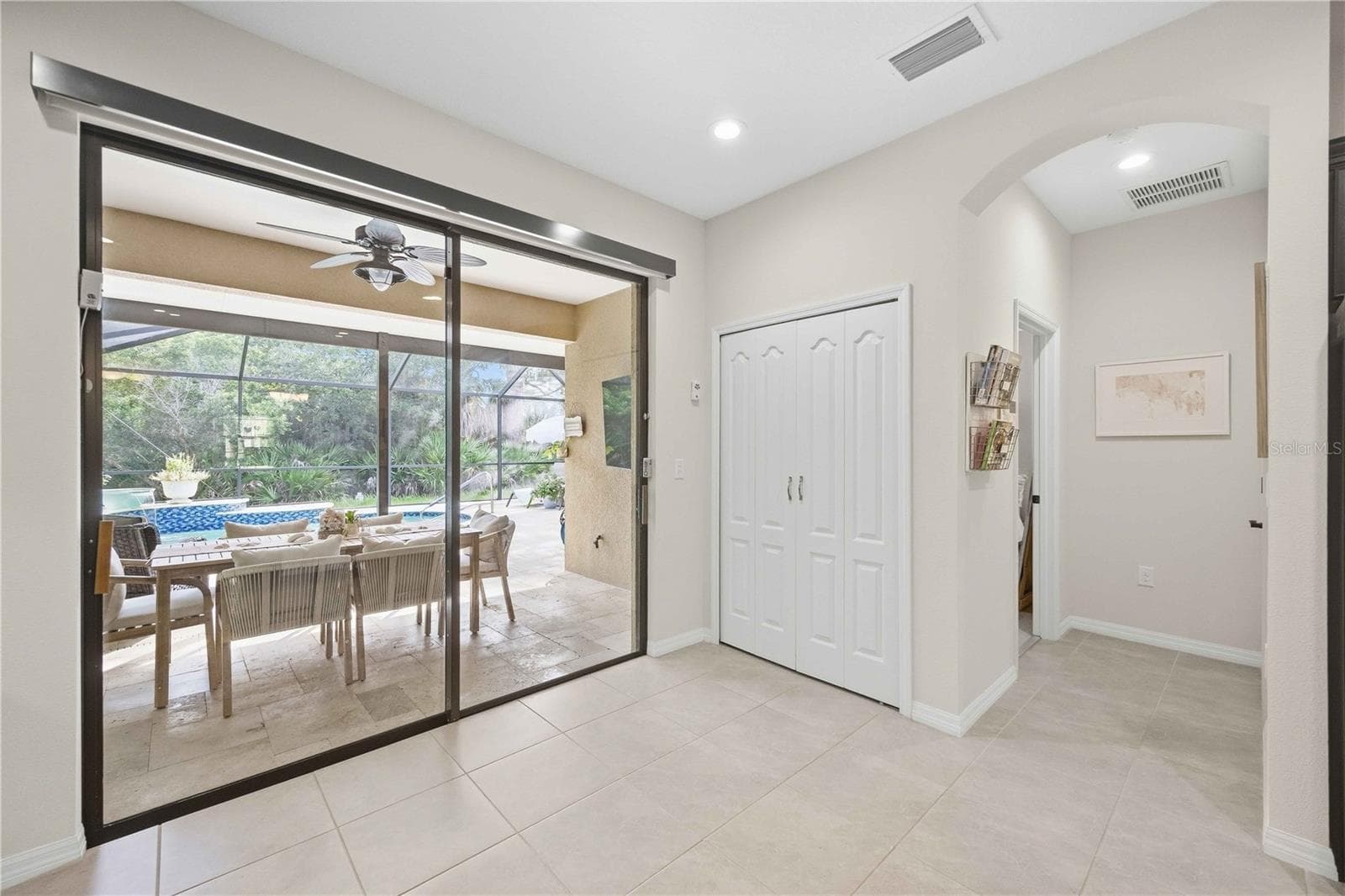 Slider door with retractable shade screen to lanai and pool - 216 MARCHENO WAY, NORTH VENICE