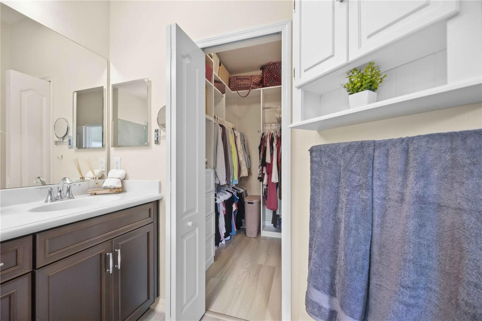 Primary bathroom and walk in closet with custom shelving - 216 MARCHENO WAY, NORTH VENICE