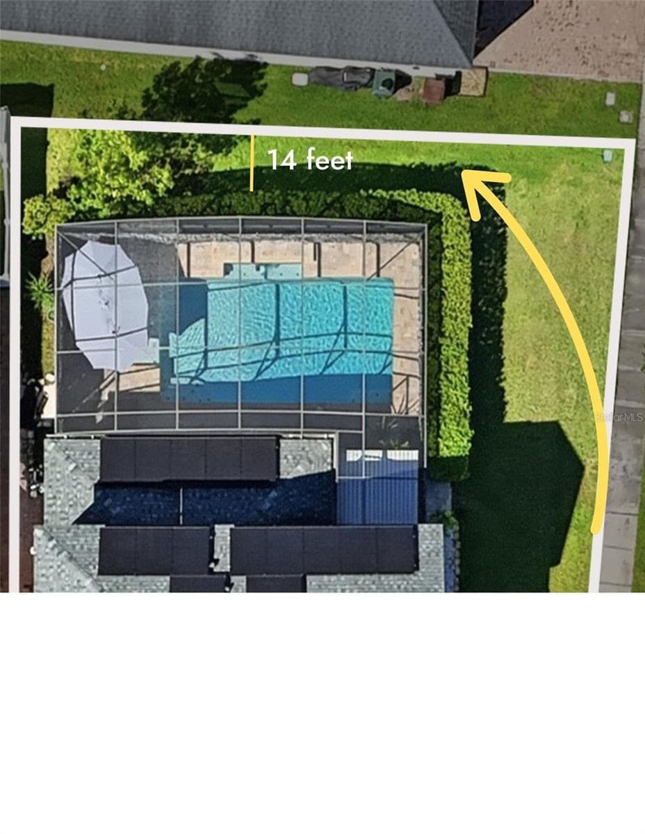 Photo is Virtually enhanced.                 The hedges can be removed to allow for fencing around the entire property, with plenty of additional yard space behind them to create your own private oasis. - 3020 CARDILLINO WAY, KISSIMMEE