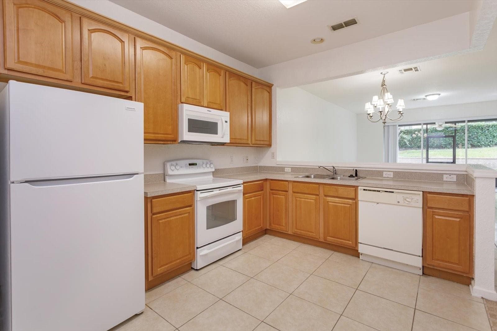 Spacious kitchen with area for dinette seating - 2520 STOCKTON DR, SANFORD