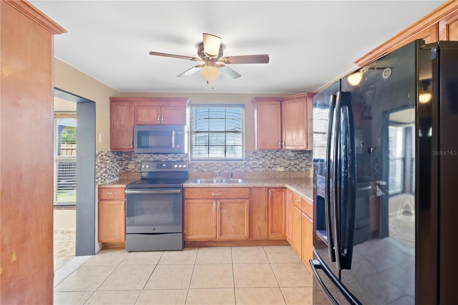 Spacious Kitchen w/wood cabinets - 3770 SW 147TH LANE RD, OCALA