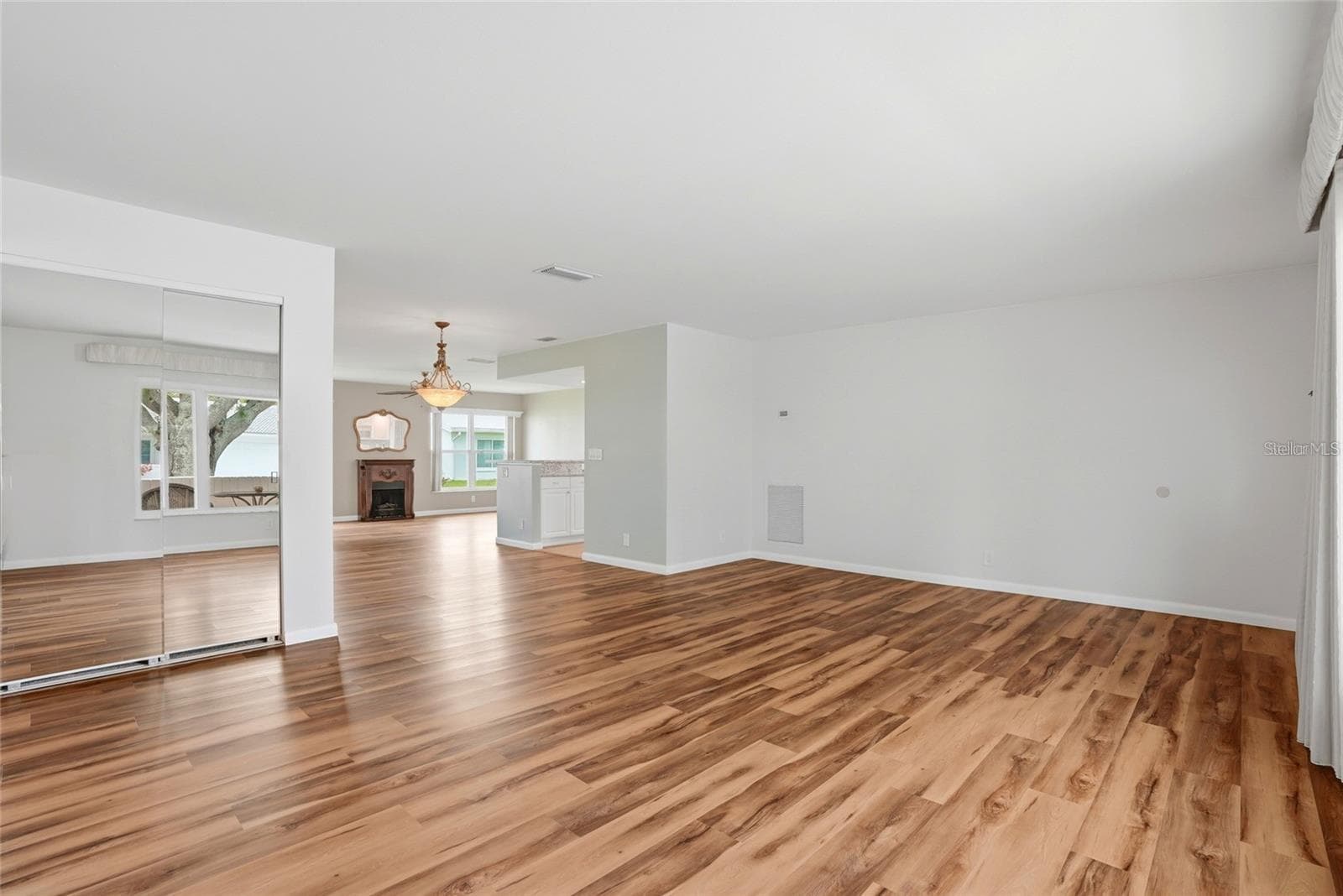 Notice the elegant luxury vinyl flooring. - 3939 90TH TER N, PINELLAS PARK