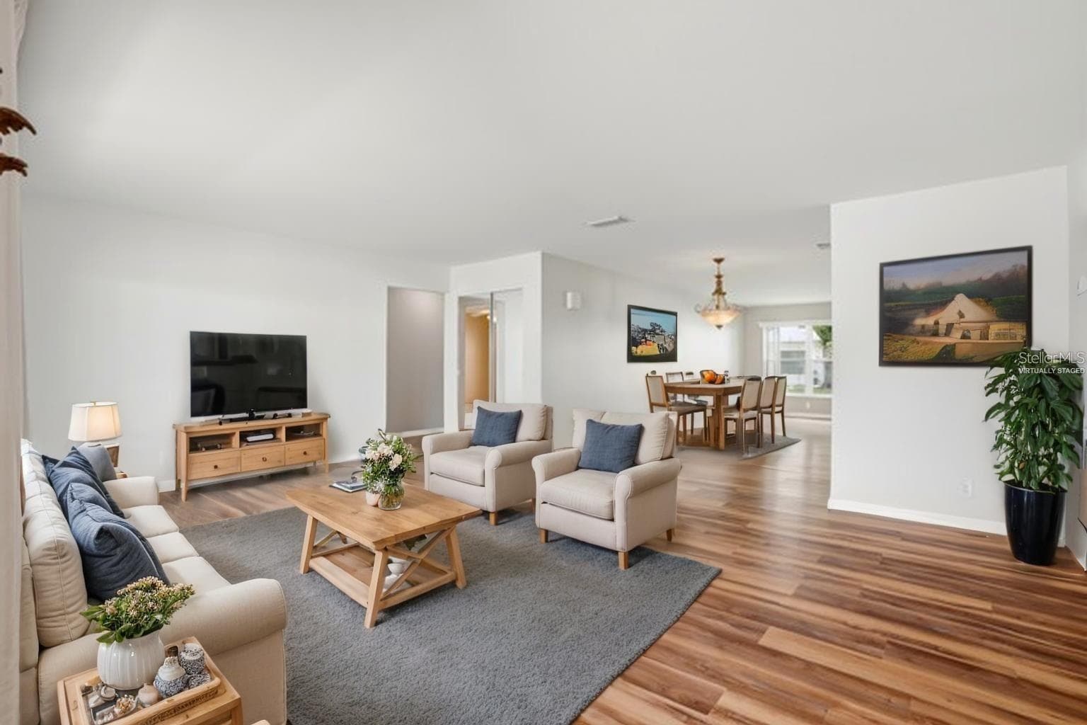 Virtually staged living room - 3939 90TH TER N, PINELLAS PARK