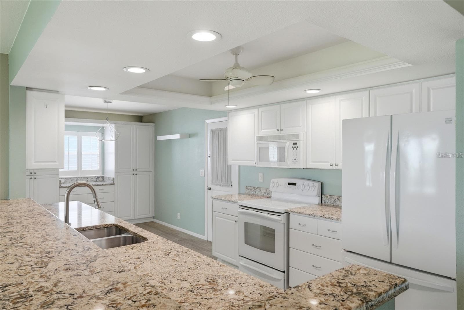 Seller used the same corian counters in the bathrooms as well. - 3939 90TH TER N, PINELLAS PARK