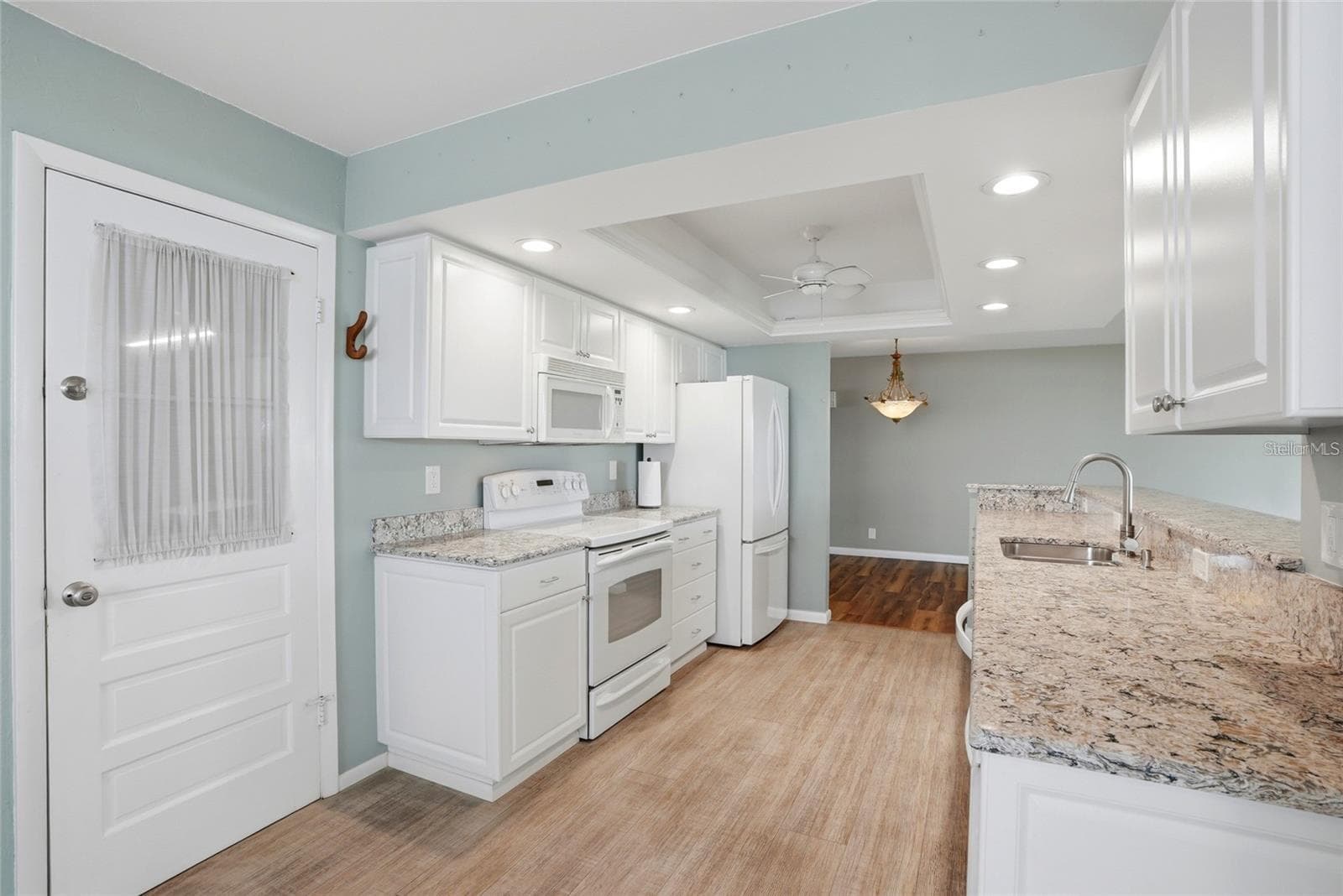 The 2 car garage is off of the kitchen. - 3939 90TH TER N, PINELLAS PARK