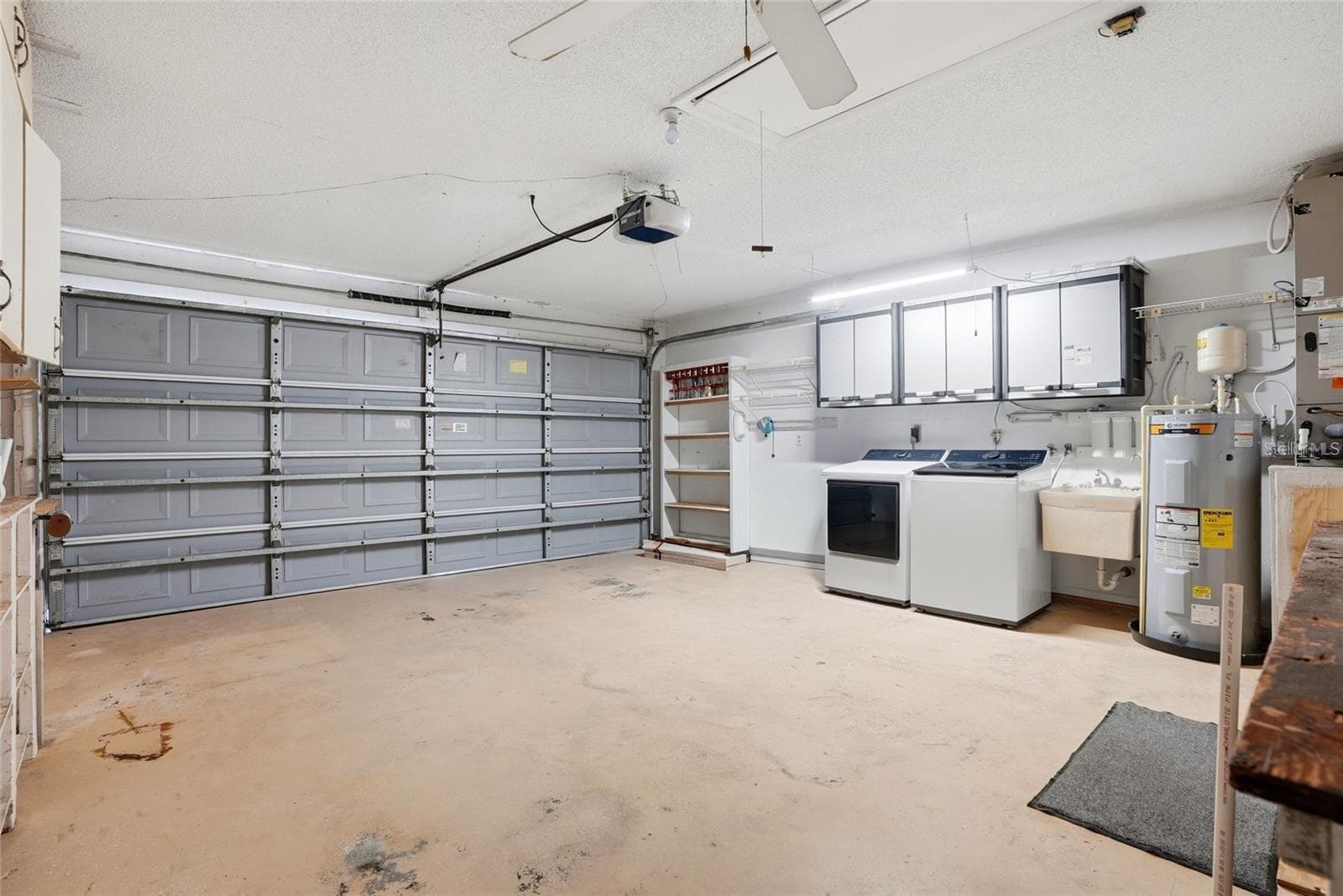 2 car garage. Washer and dryer were replaced in 2024. - 3939 90TH TER N, PINELLAS PARK